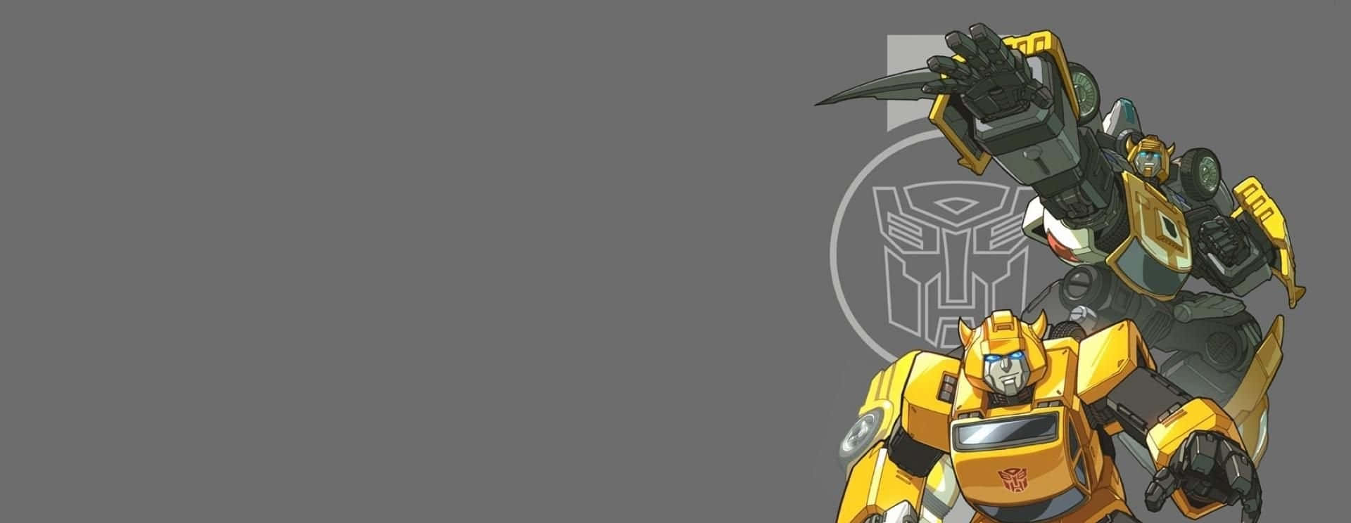 Cartoon Robot 桌布 壁紙 — 兩個變形金剛機械人，一個黃色一個深灰色，在純灰色背景前準備就緒，帶有Autobot標誌。