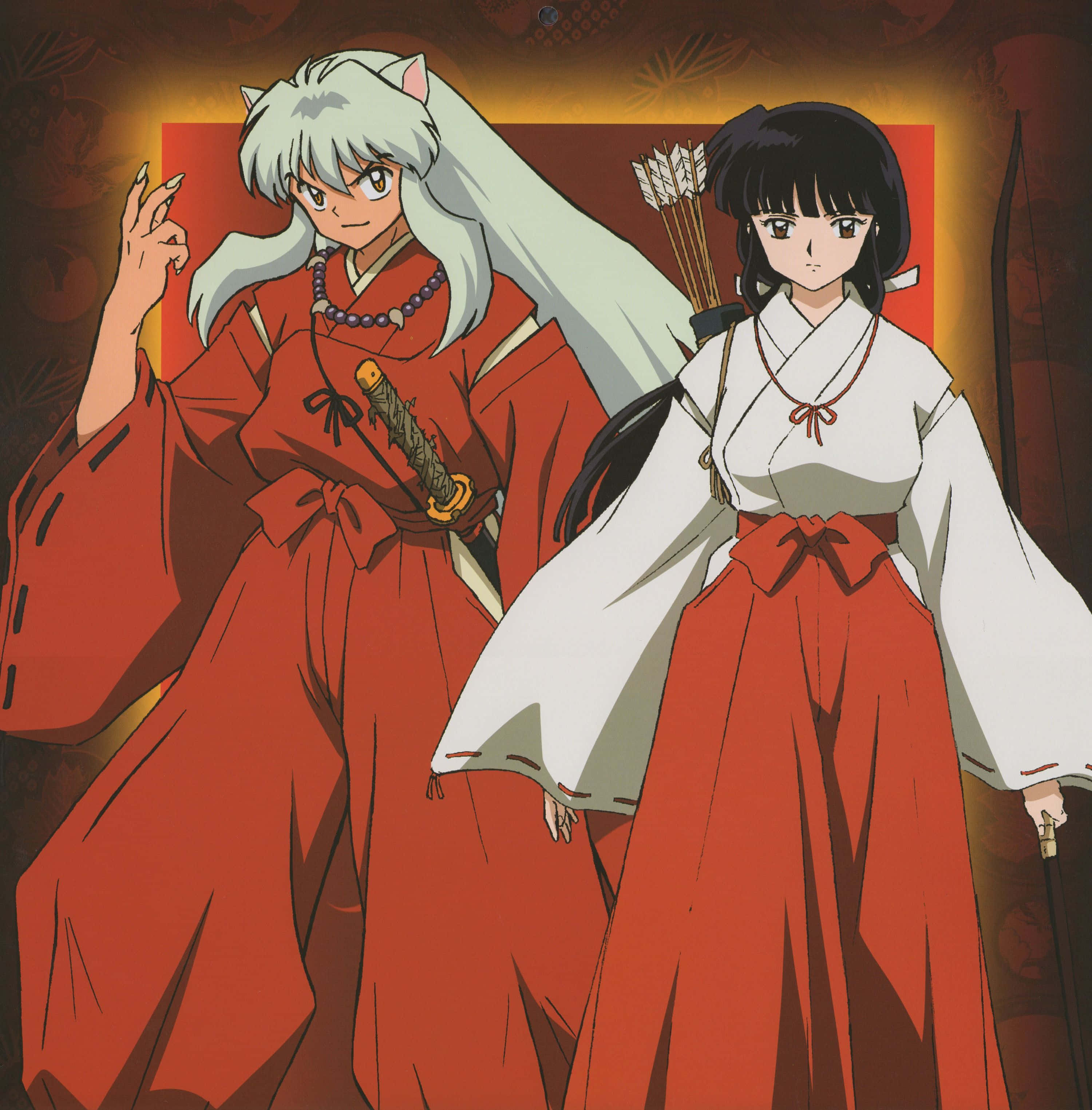 Inuyasha And Kikyo 桌布 壁紙 — 兩個身穿傳統紅白長袍的動漫角色，自信地站在溫暖發光的背景前。