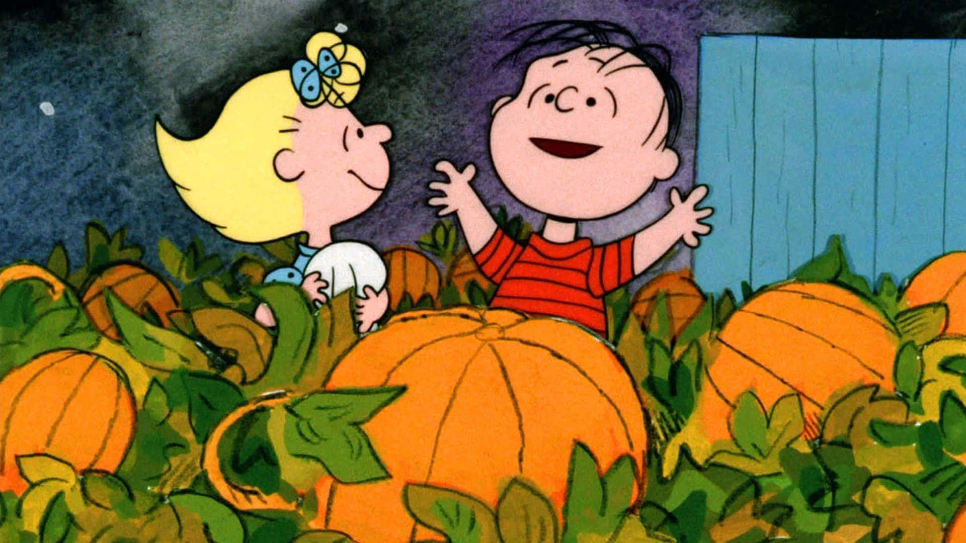 The Great Pumpkin 桌布 壁紙 — 兩個開心的卡通小孩在黑暗天空下，於充滿活力的南瓜田裡歡笑。