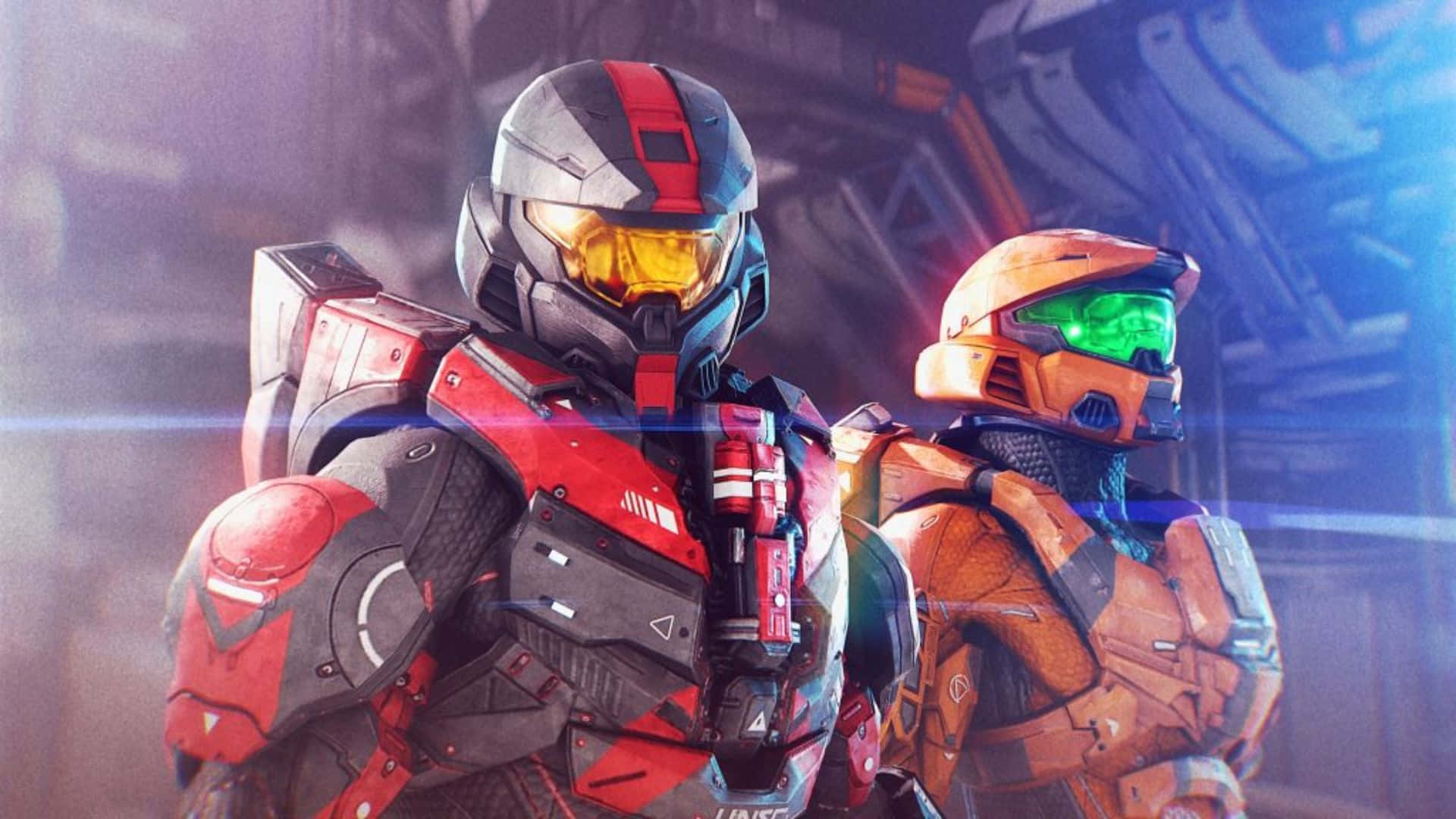 Halo Infinite 桌布 壁紙 — 兩名身穿紅色和橙色動力裝甲的裝甲士兵並排站立在一個帶有發光護目鏡的未來科幻場景中。