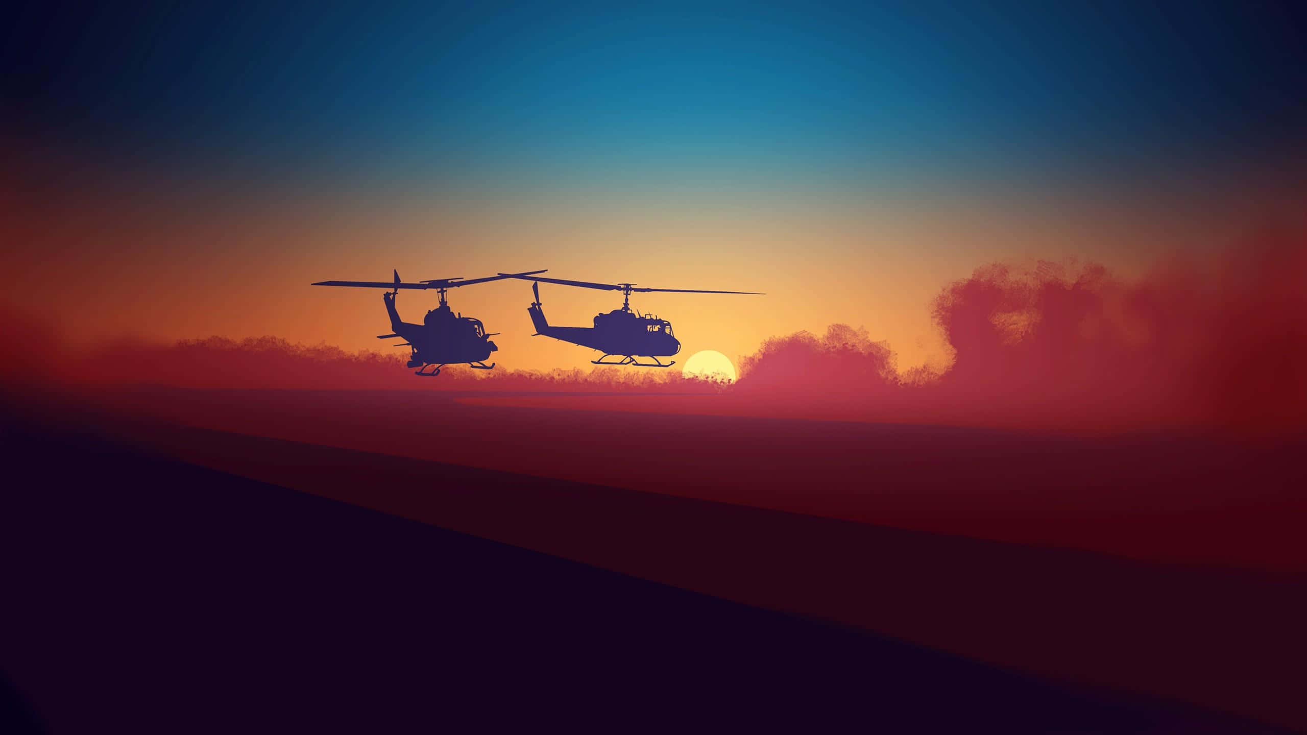 Minimalist Sunset 桌布 壁紙 — 兩架直升機的剪影在火紅的日落天空下飛行，下方有煙霧飄散。