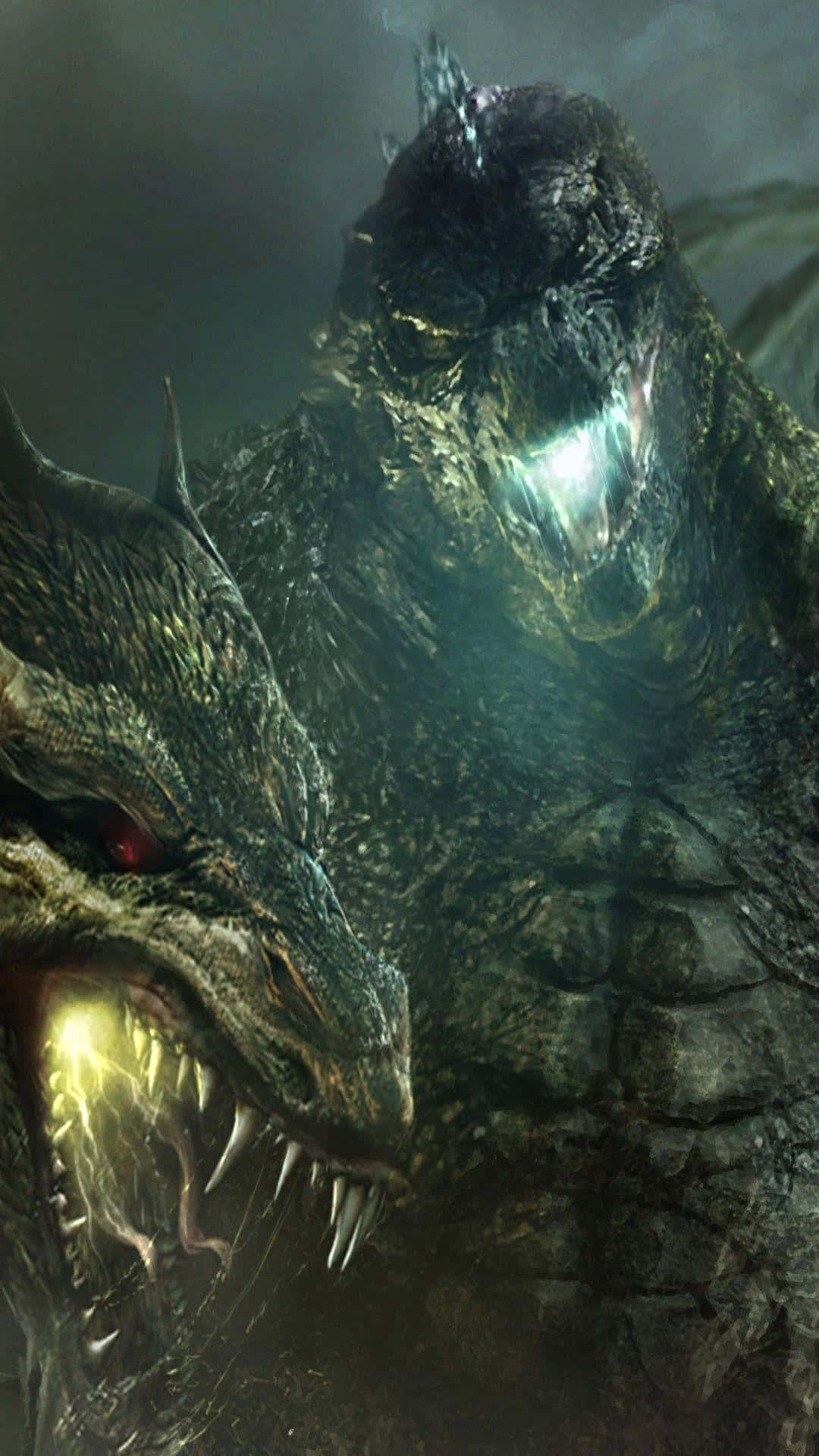 Godzilla Earth 桌布 壁紙 — 兩隻巨大的怪物在黑暗迷霧中對峙，眼睛發光，露出鋒利的牙齒。