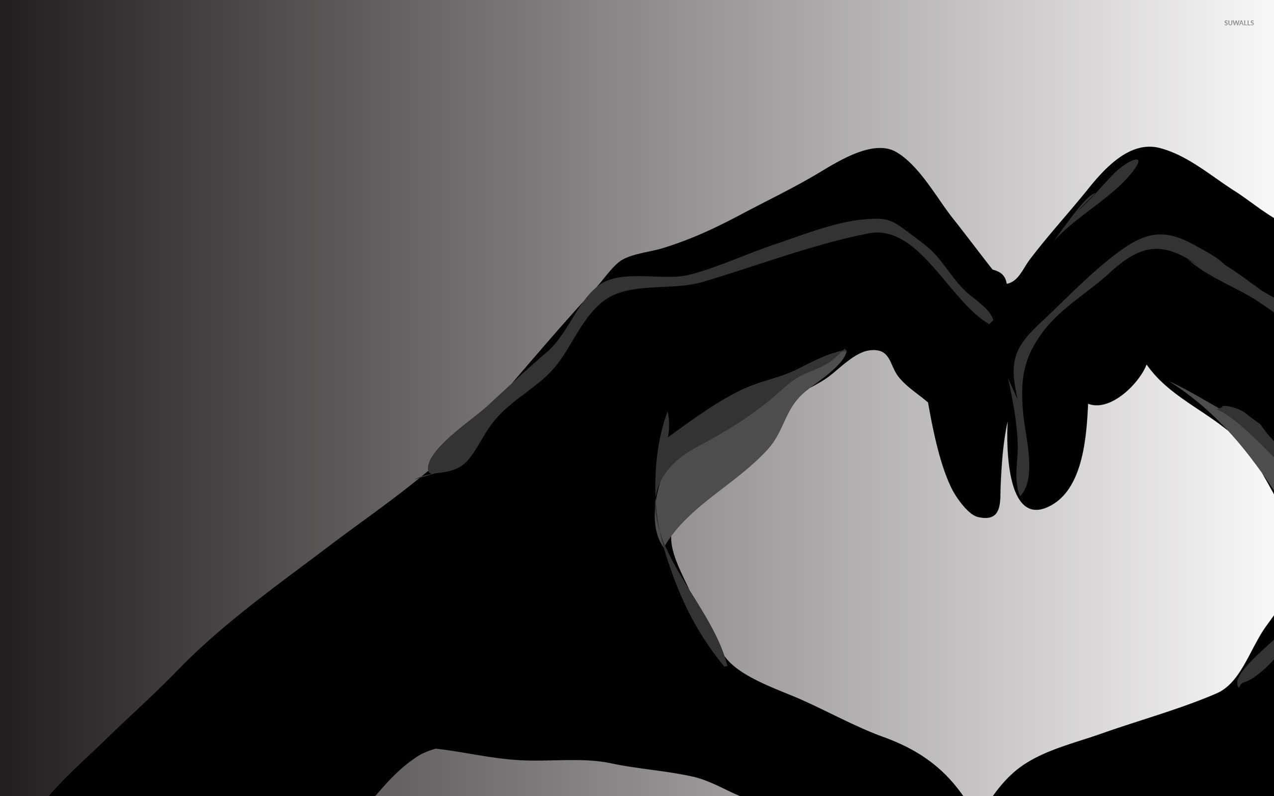 Lovers 桌布 壁紙 — 兩隻手在平滑漸變灰色背景上形成心形，光線柔和。