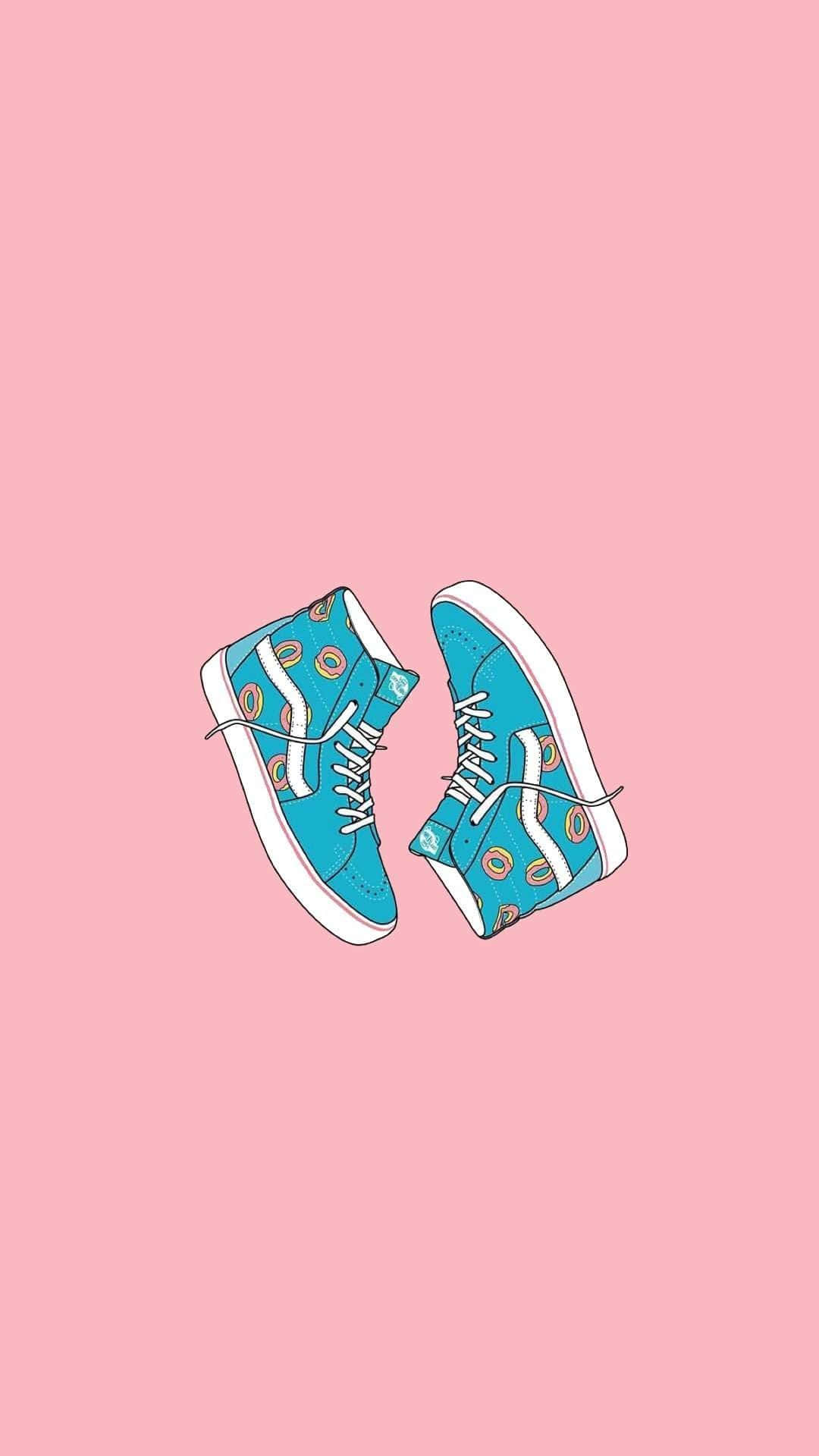 Cute Shoes 桌布 壁紙 — 兩雙帶有冬甩圖案的藍綠色高筒運動鞋漂浮在柔和的粉紅色背景上。