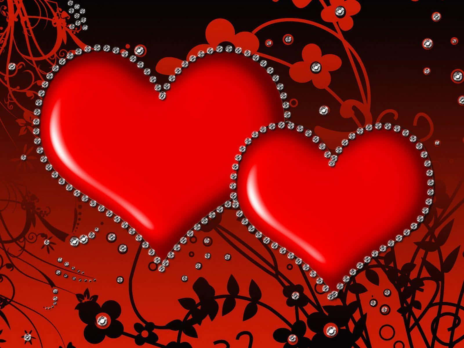 Red Heart 桌布 壁紙 — 兩顆閃亮紅心綴以閃爍鑽石，漂浮在帶有黑色花卉漩渦的濃郁紅色背景上。