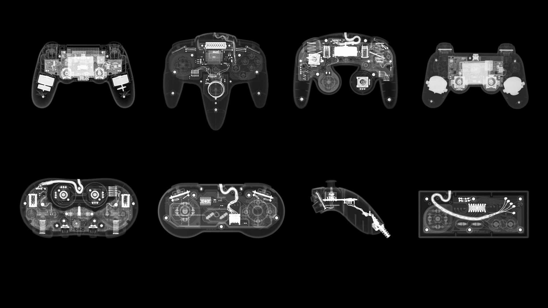 Cool Gaming 桌布 壁紙 — 八個遊戲控制器的X光視圖，在黑色背景上揭示複雜的內部電路和組件。