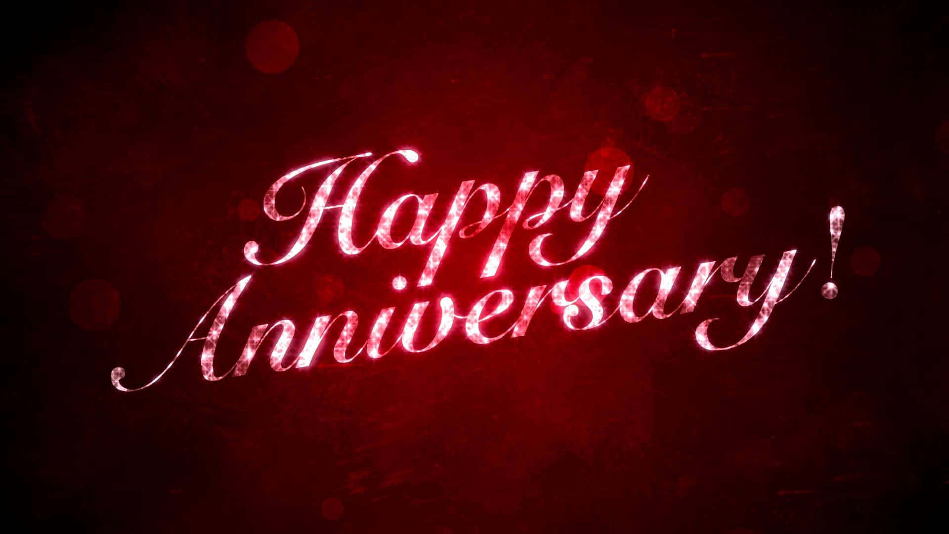 共度又一年，慶祝紀念日 壁紙 — 發光的紅色閃光文字顯示「Happy Anniversary」，背景為深色紋理紅色背景，帶有散景燈光。