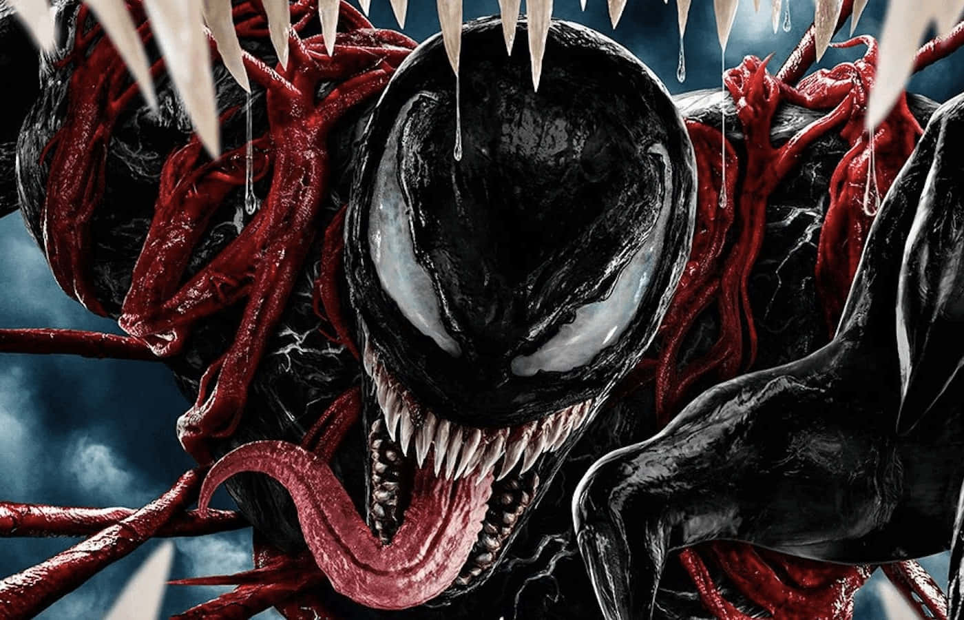 Venom Comic Book 桌布 壁紙 — 共生體毒液的特寫，帶有發光的白色眼睛滴下毒液和鋒利的牙齒，背景是暴風雨的天空。