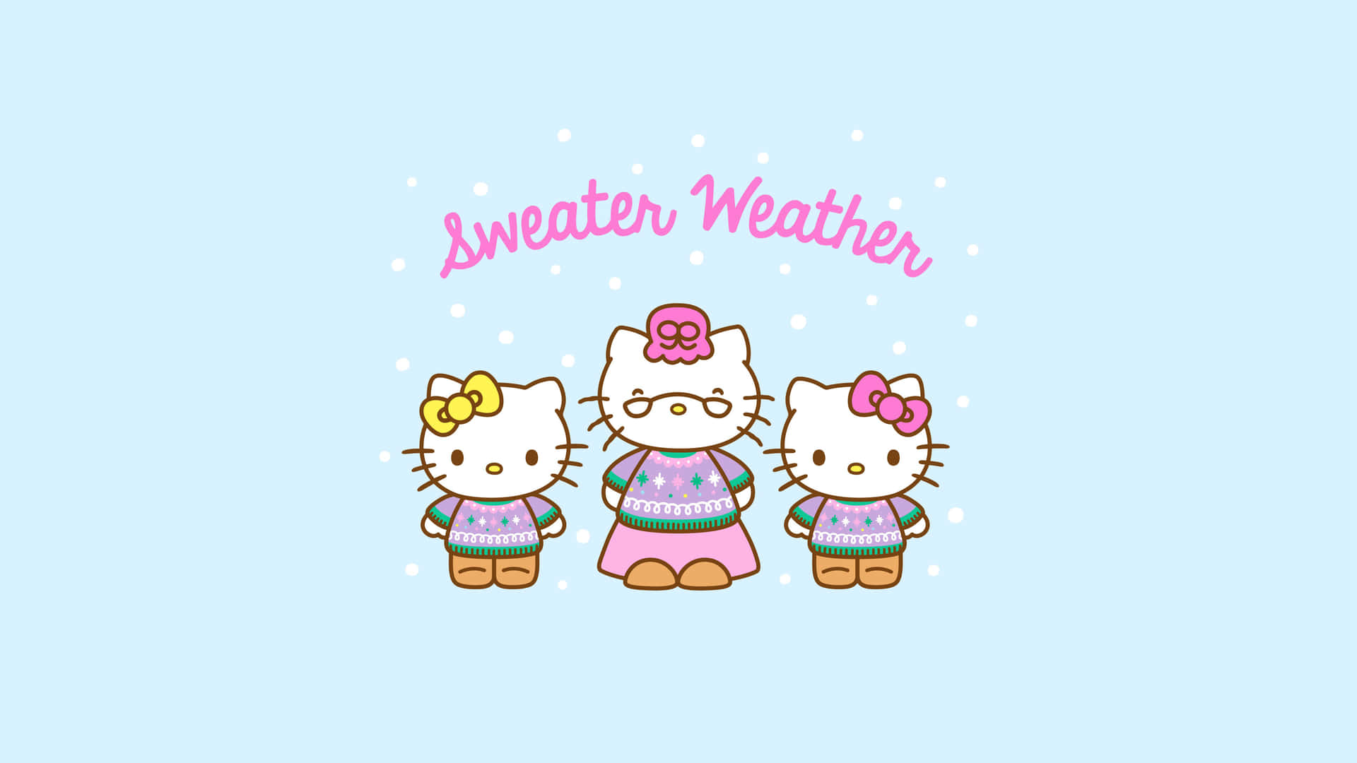 三個穿著毛衣的Hello Kitty角色在雪景中。