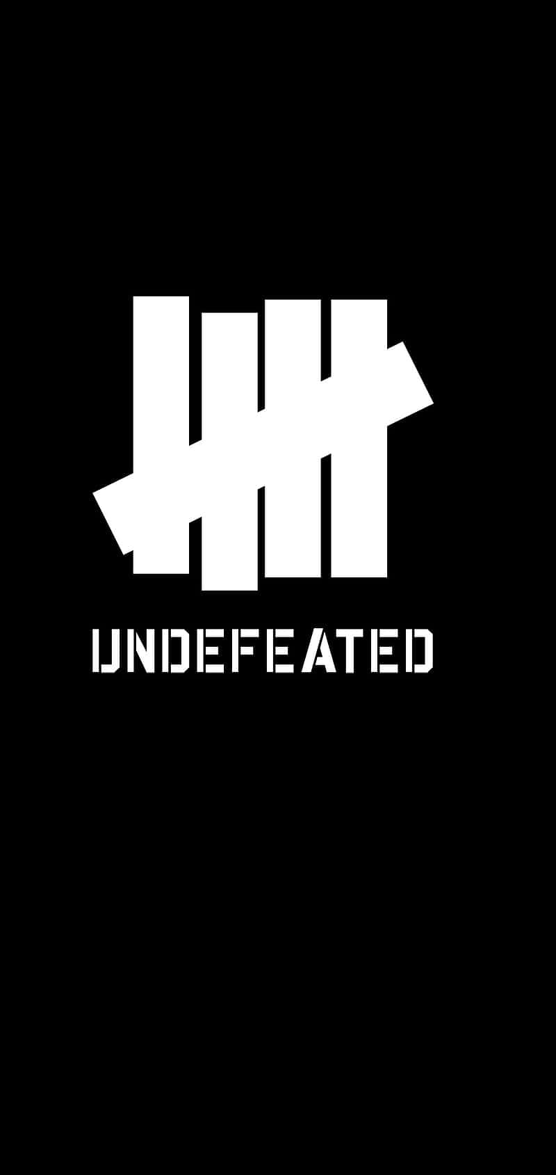 黑色背景上的白色Undefeated標誌