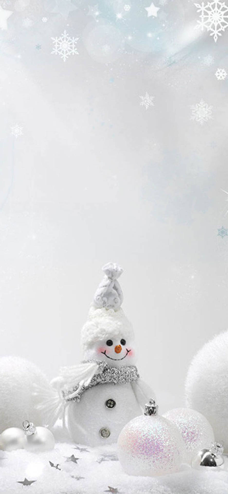 雪人戴著圍巾和帽子，被裝飾品和雪花圍繞。