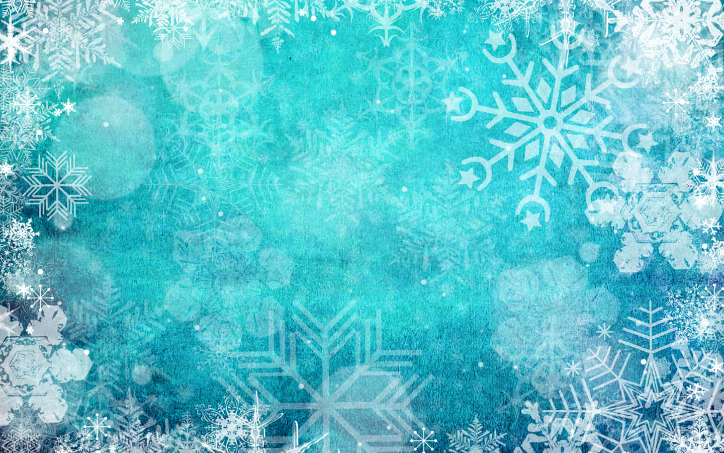 冰霜藍綠色背景，邊緣帶有白色雪花圖案。