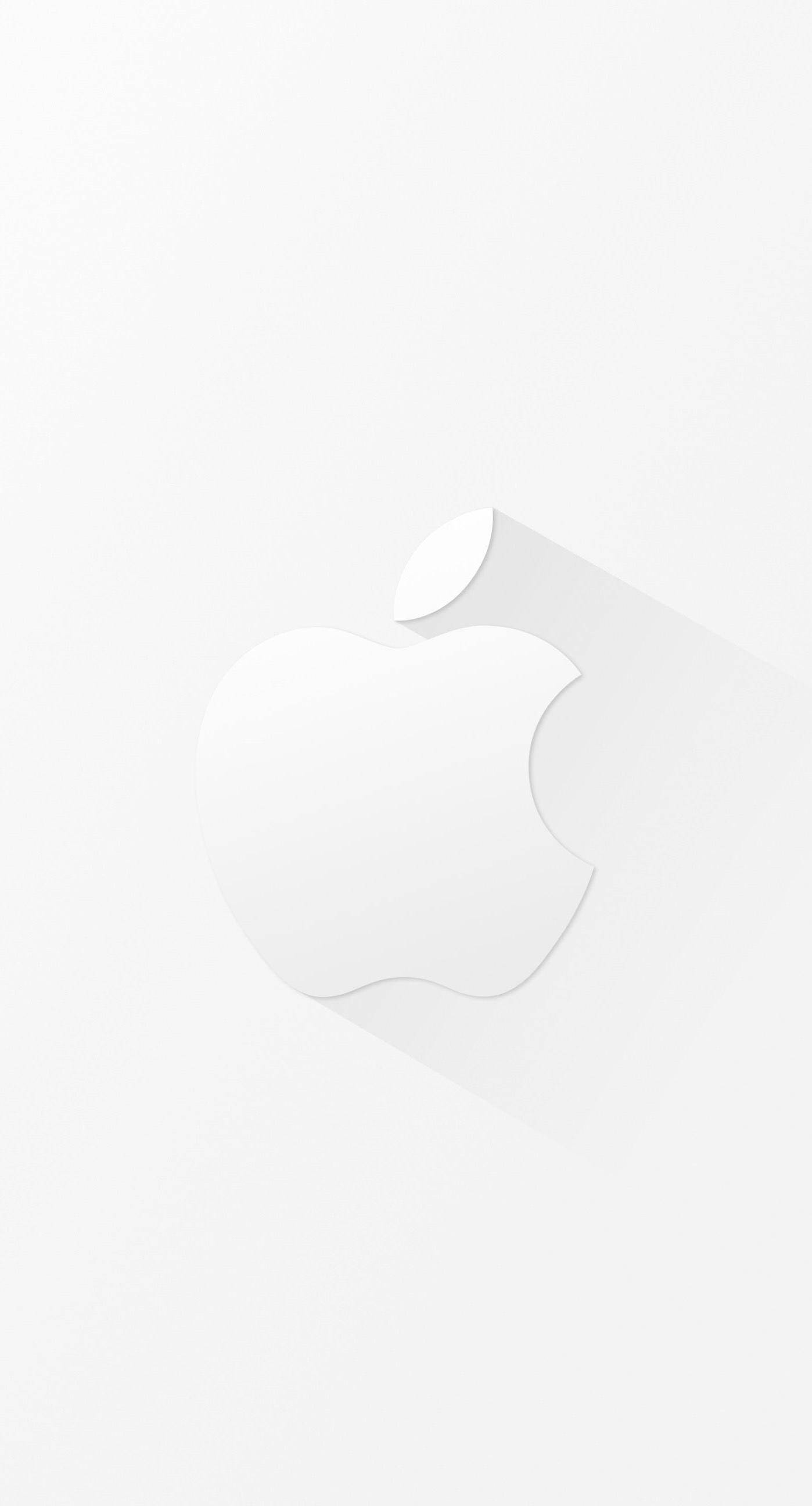 冷白色蘋果標誌 壁紙 — 一個簡約的白色Apple標誌在純白背景上投射出長而柔和的陰影。