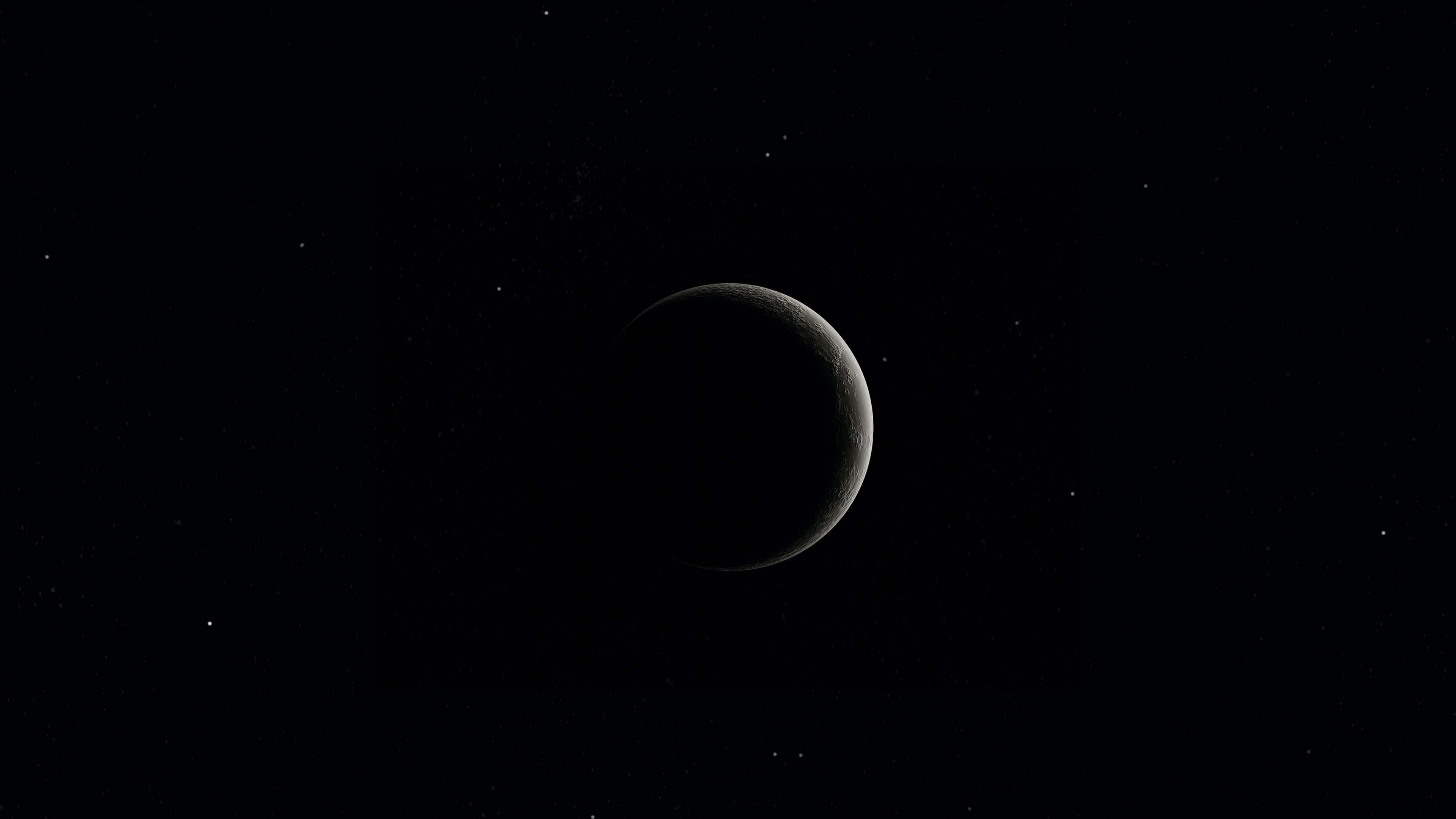 凝望無垠的深空星海 壁紙 — 一彎新月在繁星點綴的黑色天空中柔和發光，呈現寧靜的宇宙場景。