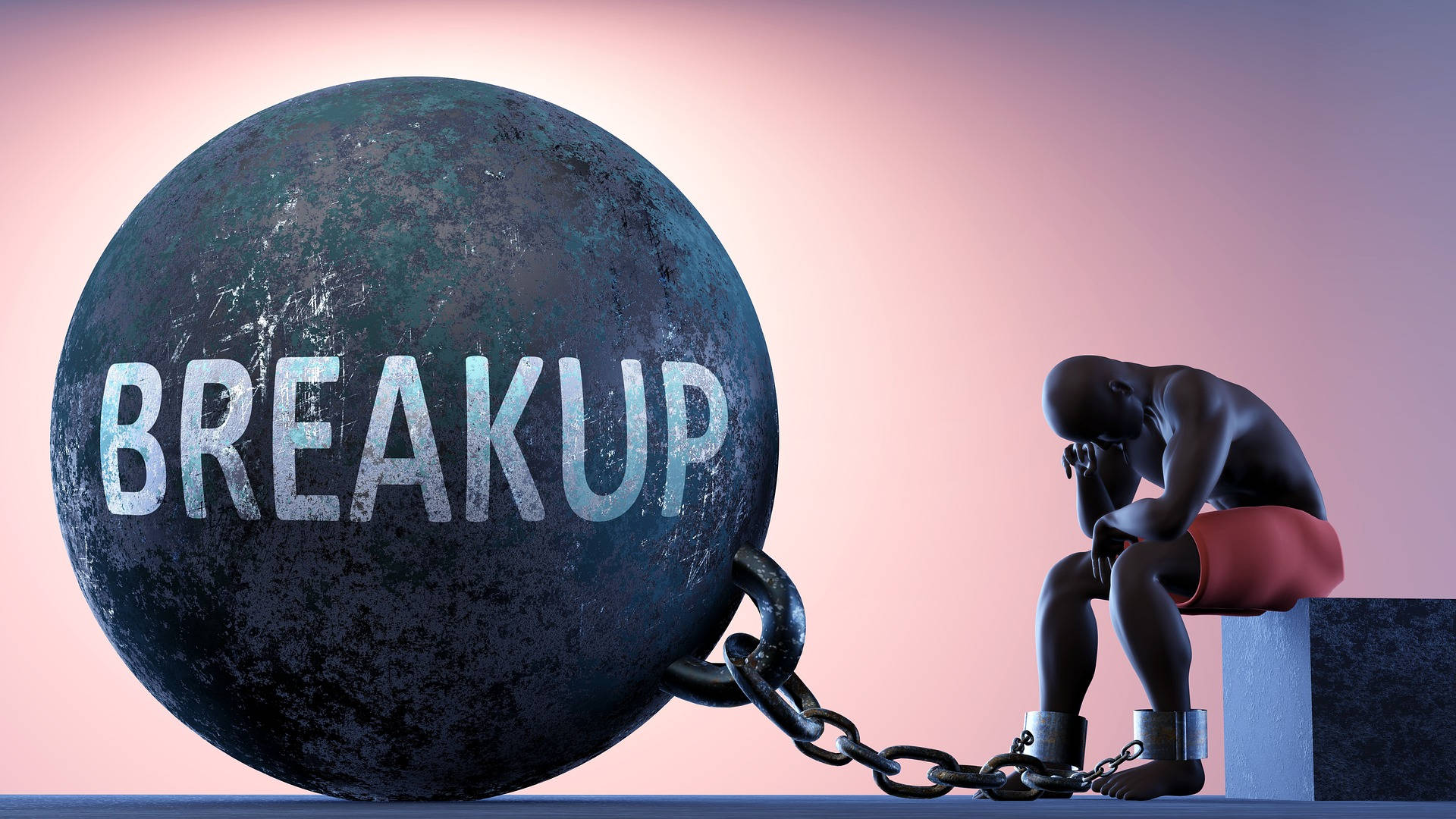 一個被鎖鏈鎖住的人物坐在一個標有「breakup」的大球體旁邊。