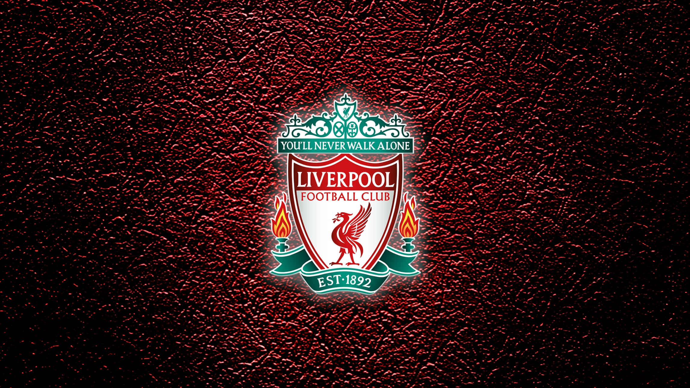 Liverpool Logo 桌布 壁紙 — 利物浦足球會徽章在質感深紅色皮革背景上發出紅綠光芒。