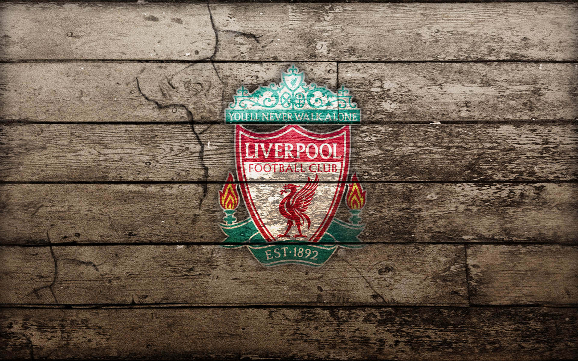 Liverpool 桌布 壁紙 — 利物浦足球會徽章繪於經風化的木板上，帶有裂紋質感和褪色色彩。