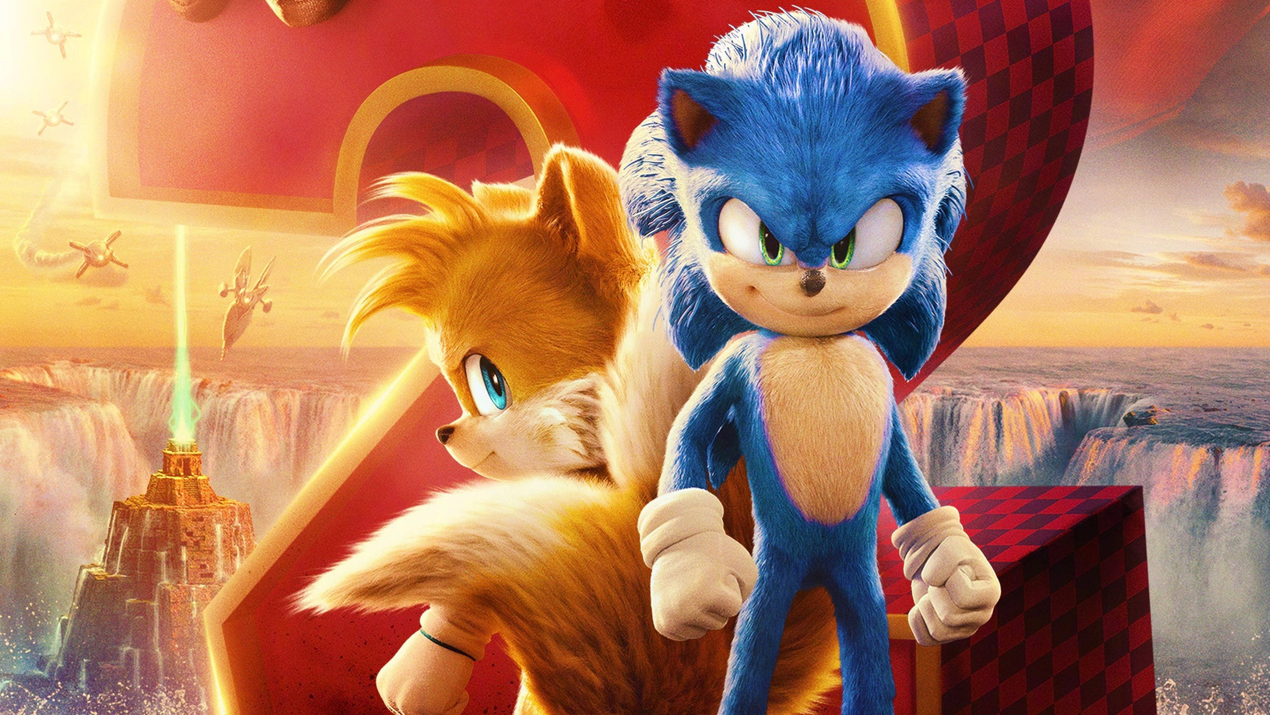 刺猬索尼克2 截圖 壁紙 — Sonic 和 Tails 在充滿活力的日落背景下英勇站立，背景有浮島和發光的金字塔。