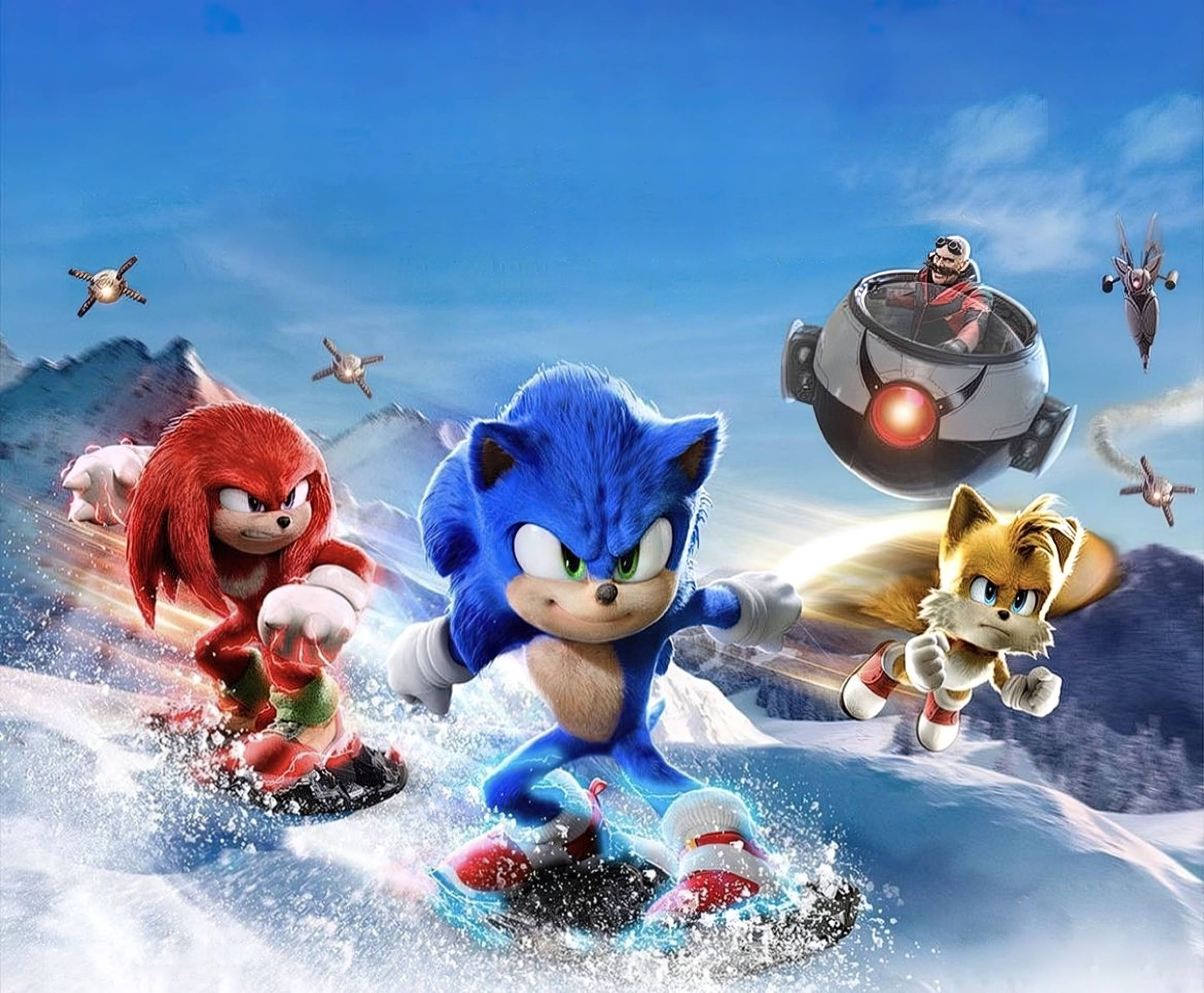 刺猬索尼克2 電影截圖 壁紙 — Sonic、Knuckles 同 Tails 喺雪山玩滑雪板，Eggman 嘅機械人喺天空追住佢哋。