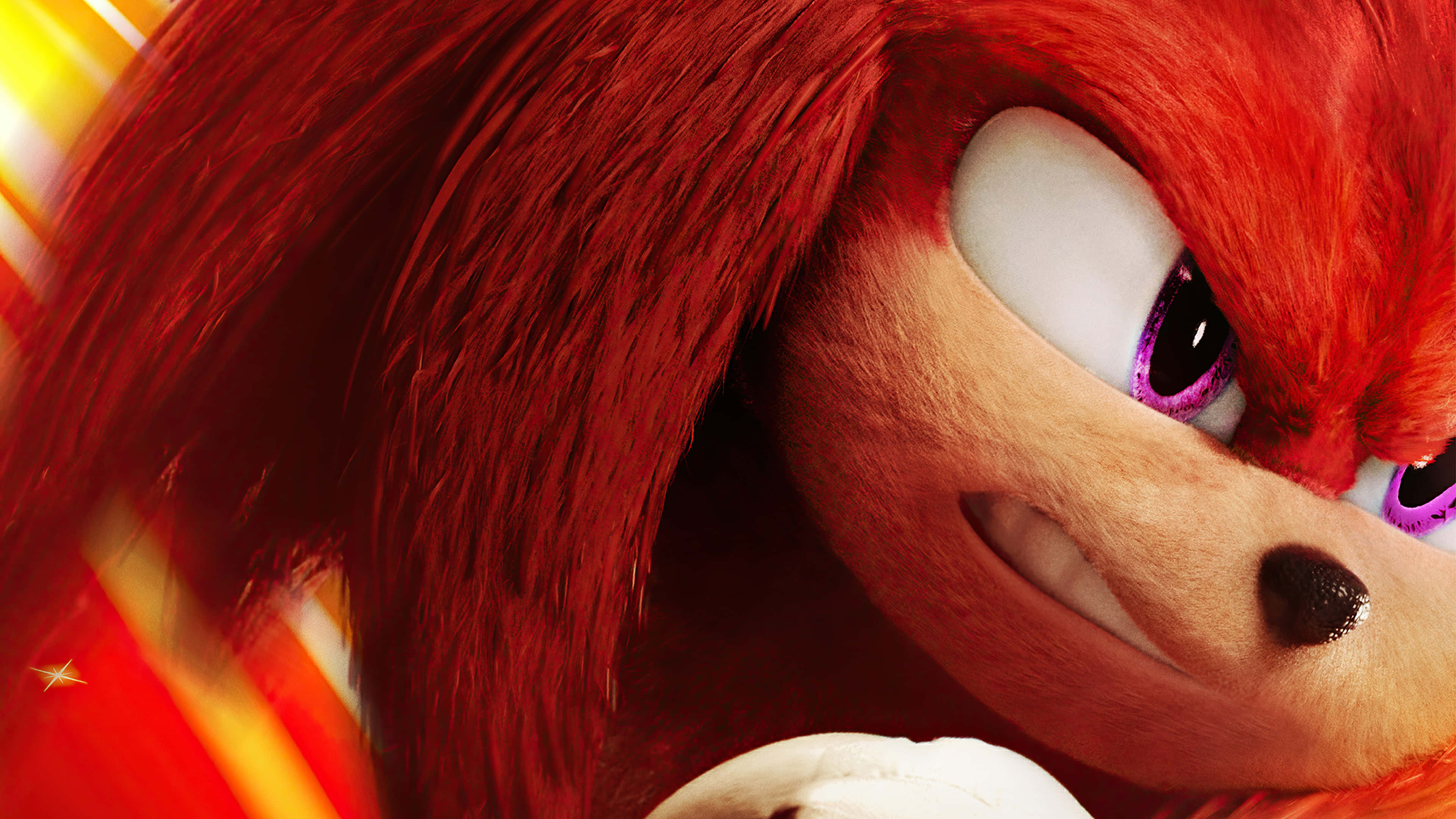 Knuckles the Echidna 嘅特寫，有強烈嘅紫色眼睛同火紅嘅刺。