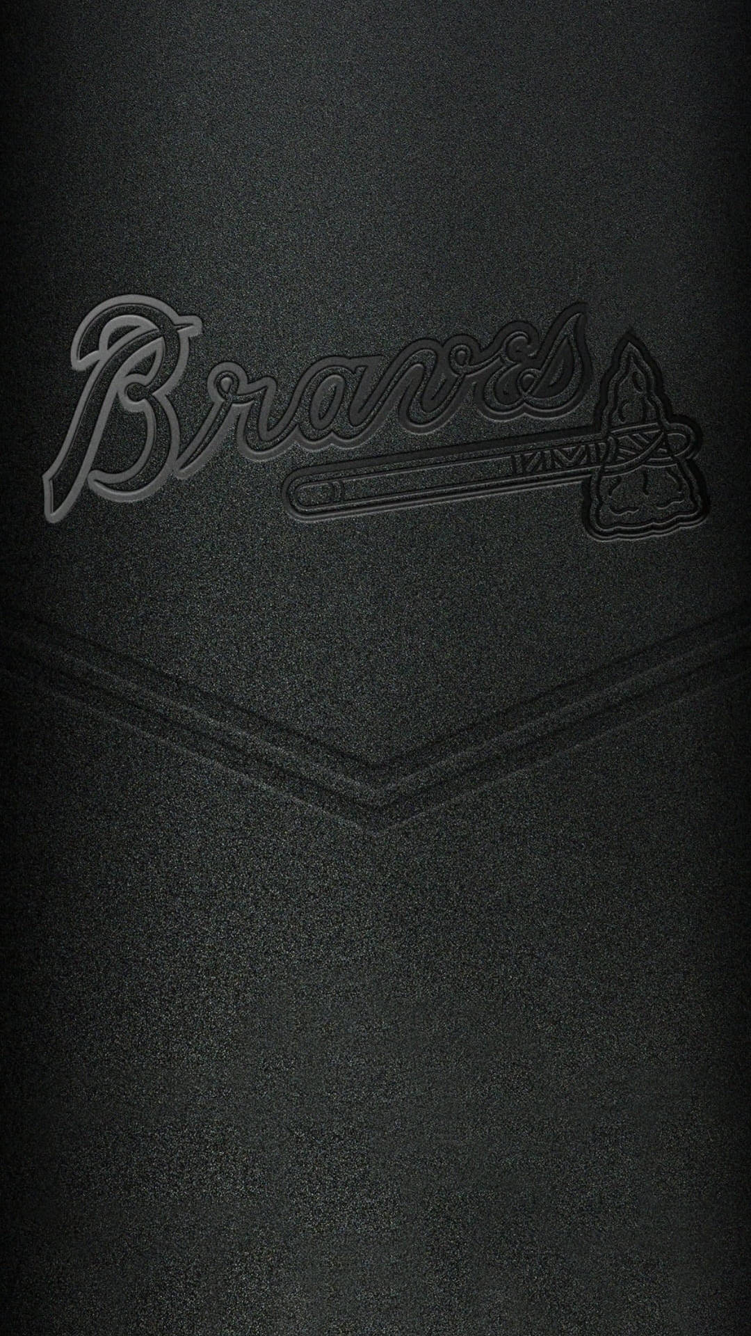 帶有壓印Braves棒球隊標誌的黑色紋理壁紙。