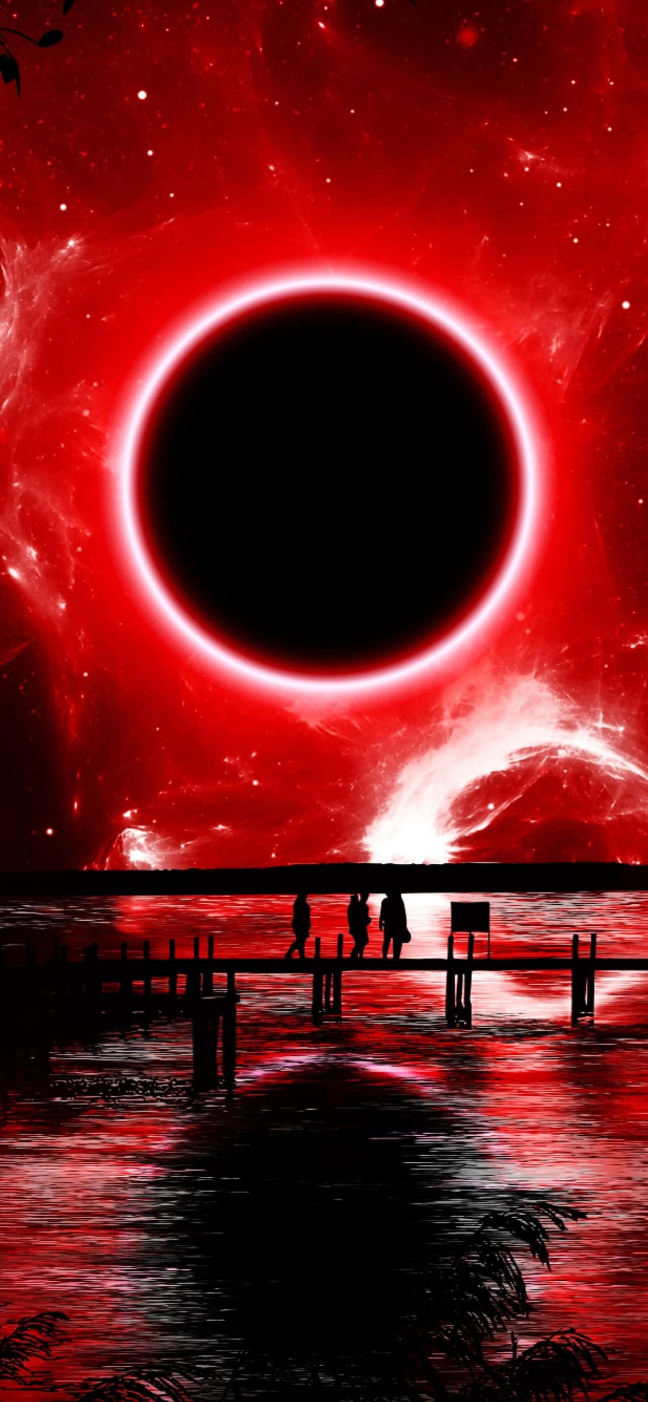 型格 iPhone 壁紙 桌布 壁紙 — 剪影人物在血紅色水中倒映的熾熱紅色宇宙日食下走過碼頭。