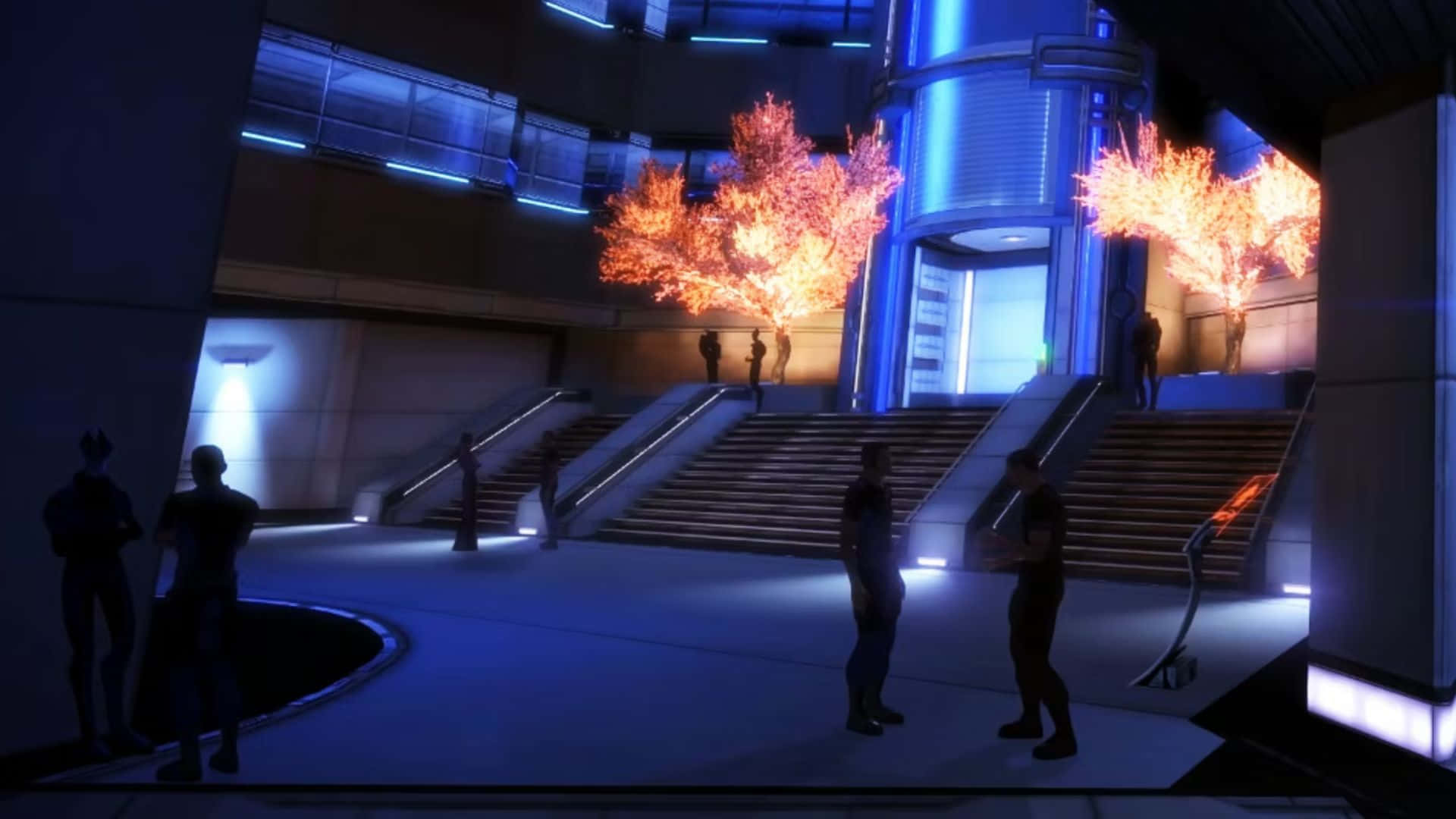 Mass Effect Citadel 桌布 壁紙 — 剪影人物站在一個未來感十足的藍色燈光中庭，兩旁是發光的橙色樹木和樓梯。