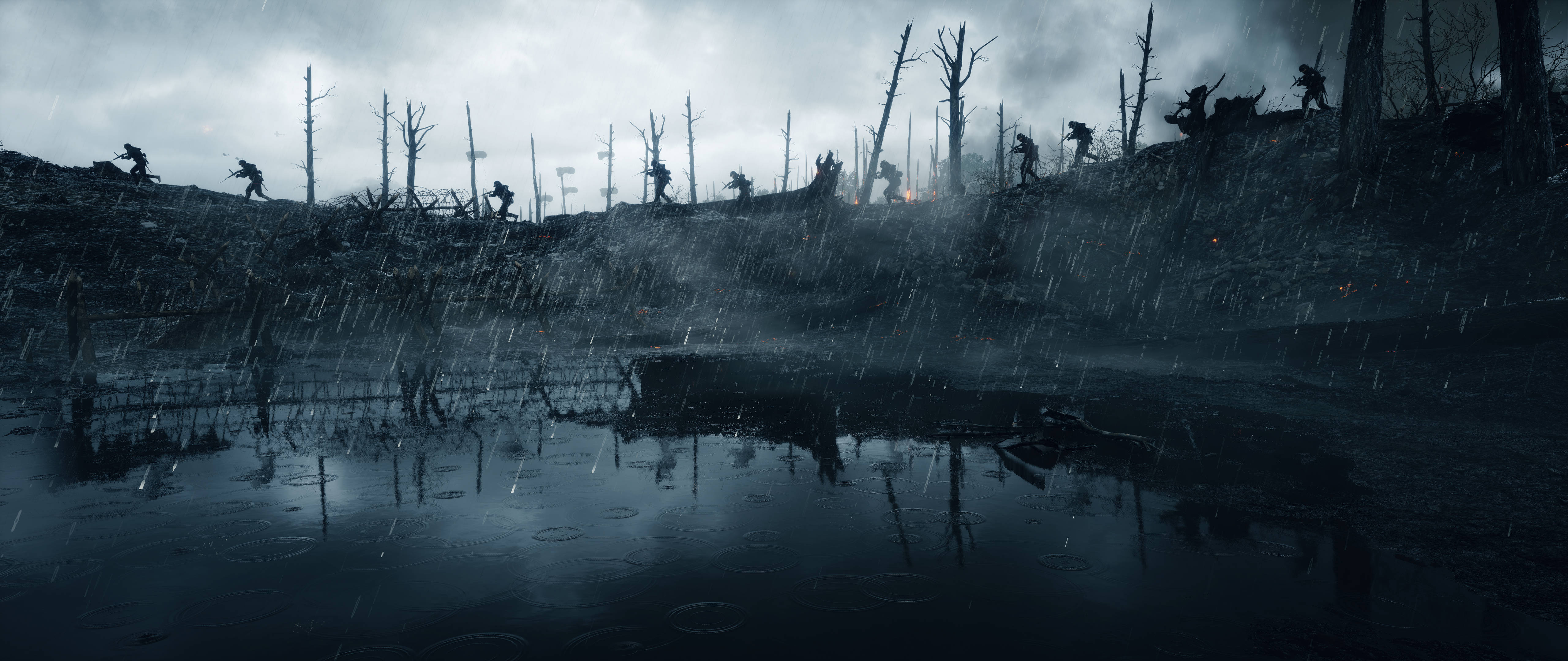 Battlefield 1 HD 桌布 壁紙 — 剪影士兵在雨水浸透、戰火摧殘的戰場上前進，枯樹和泥水映照著陰沉天空。