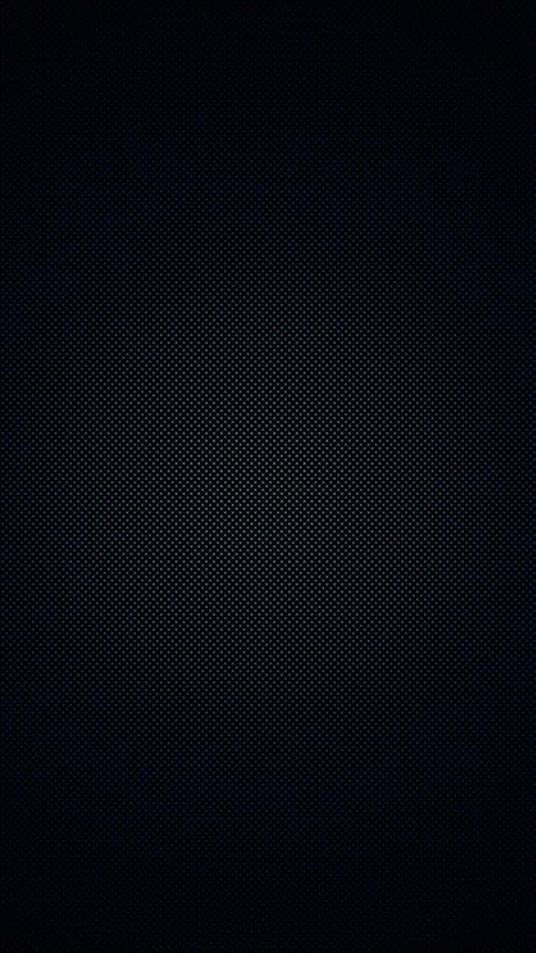 創意 iPhone，完美捕捉生活瞬間 壁紙 — 極簡黑色背景，帶有微妙的重複圓點圖案，營造出有紋理的數位表面。