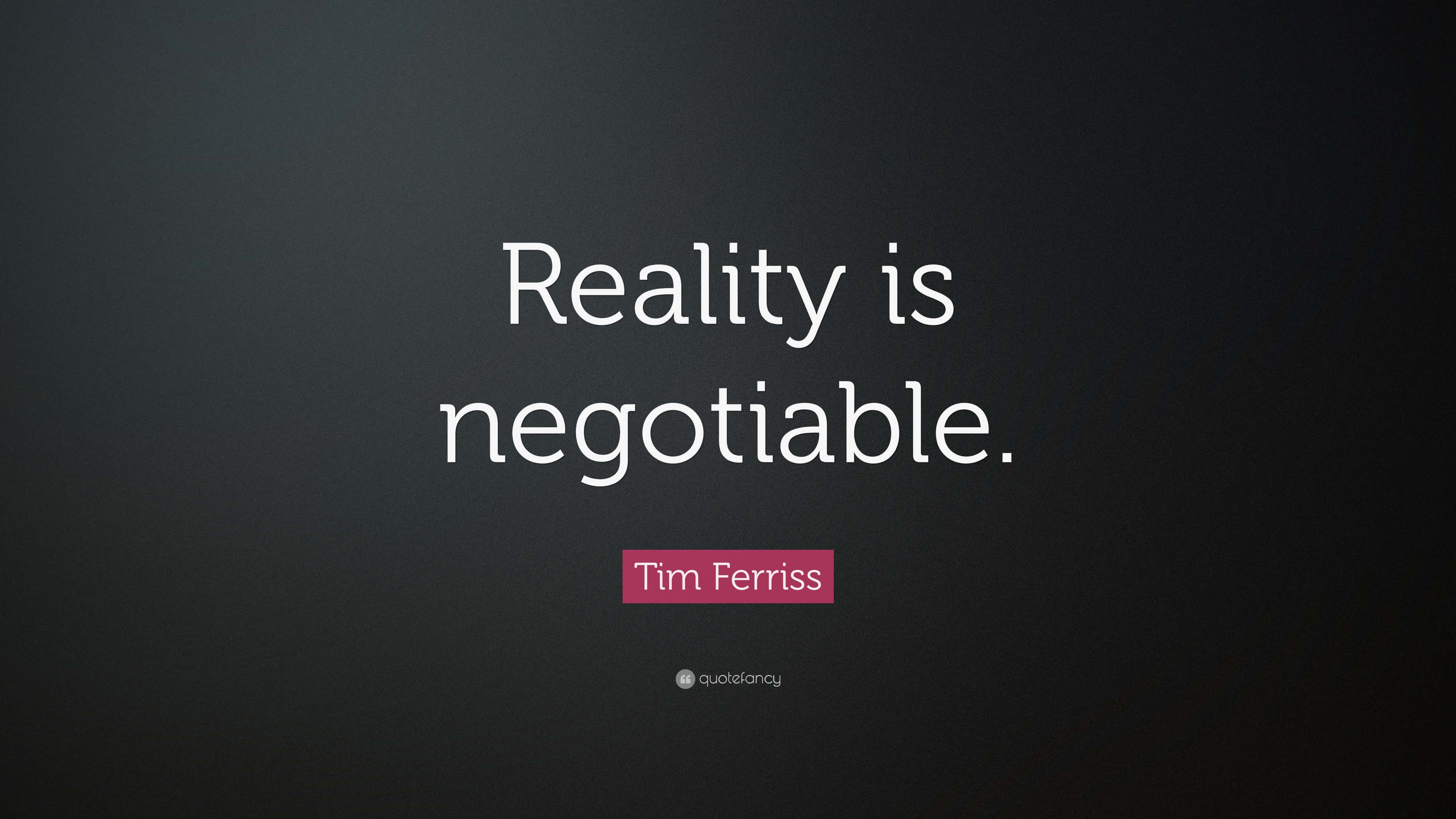 創造你自己的現實 壁紙 — 深色漸變背景上的白色文字寫著「Reality is negotiable」，歸因於 Tim Ferriss。