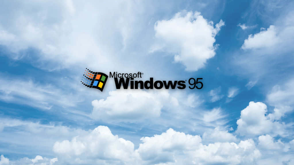 功能與效能前所未見的 Windows 95 壁紙 — Microsoft Windows 95 標誌漂浮在佈滿蓬鬆白雲的明亮藍天上。