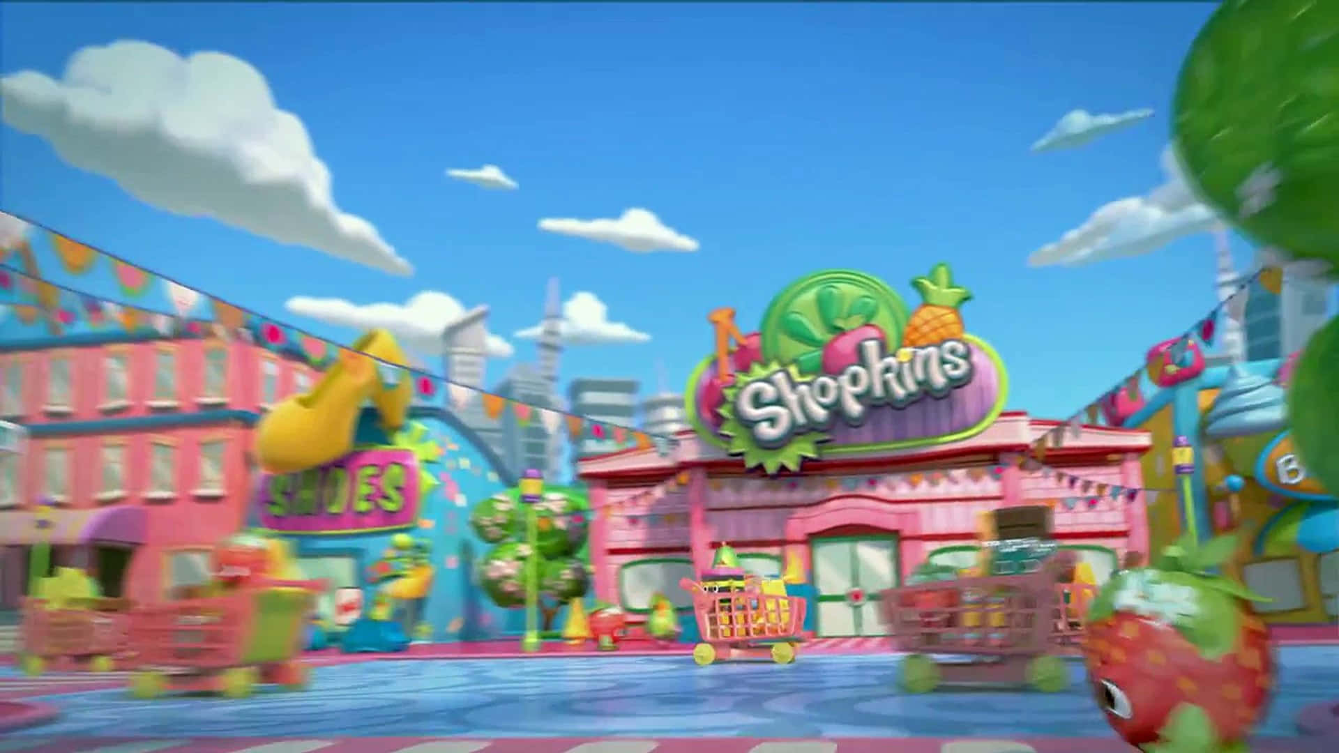 色彩繽紛的Shopkins卡通小鎮，有購物車和巨型水果角色。