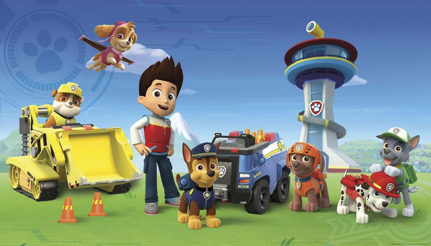 Paw Patrol 角色與車輛和塔樓在草地上。