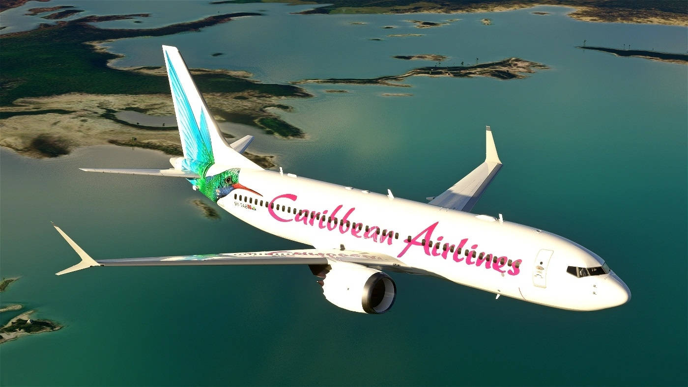 加勒比航空飛機飛越碧綠海水和綠色島嶼。