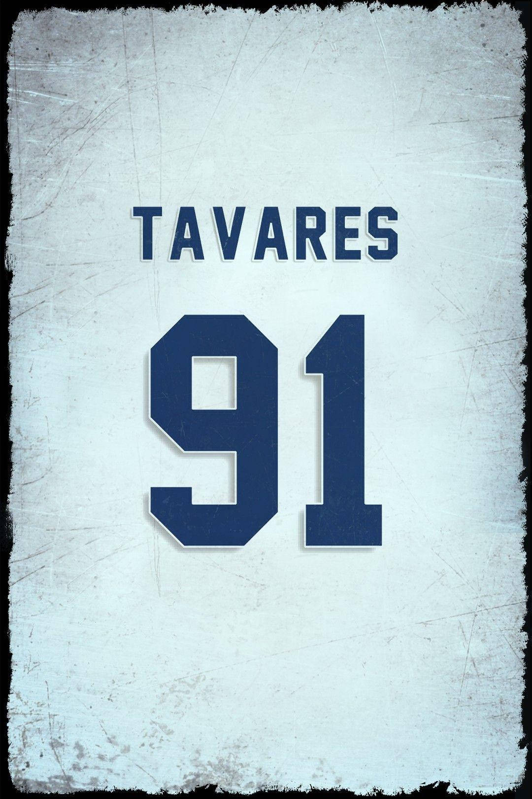 復古足球球衣，上面有名字 Tavares 和號碼 91，背景褪色。