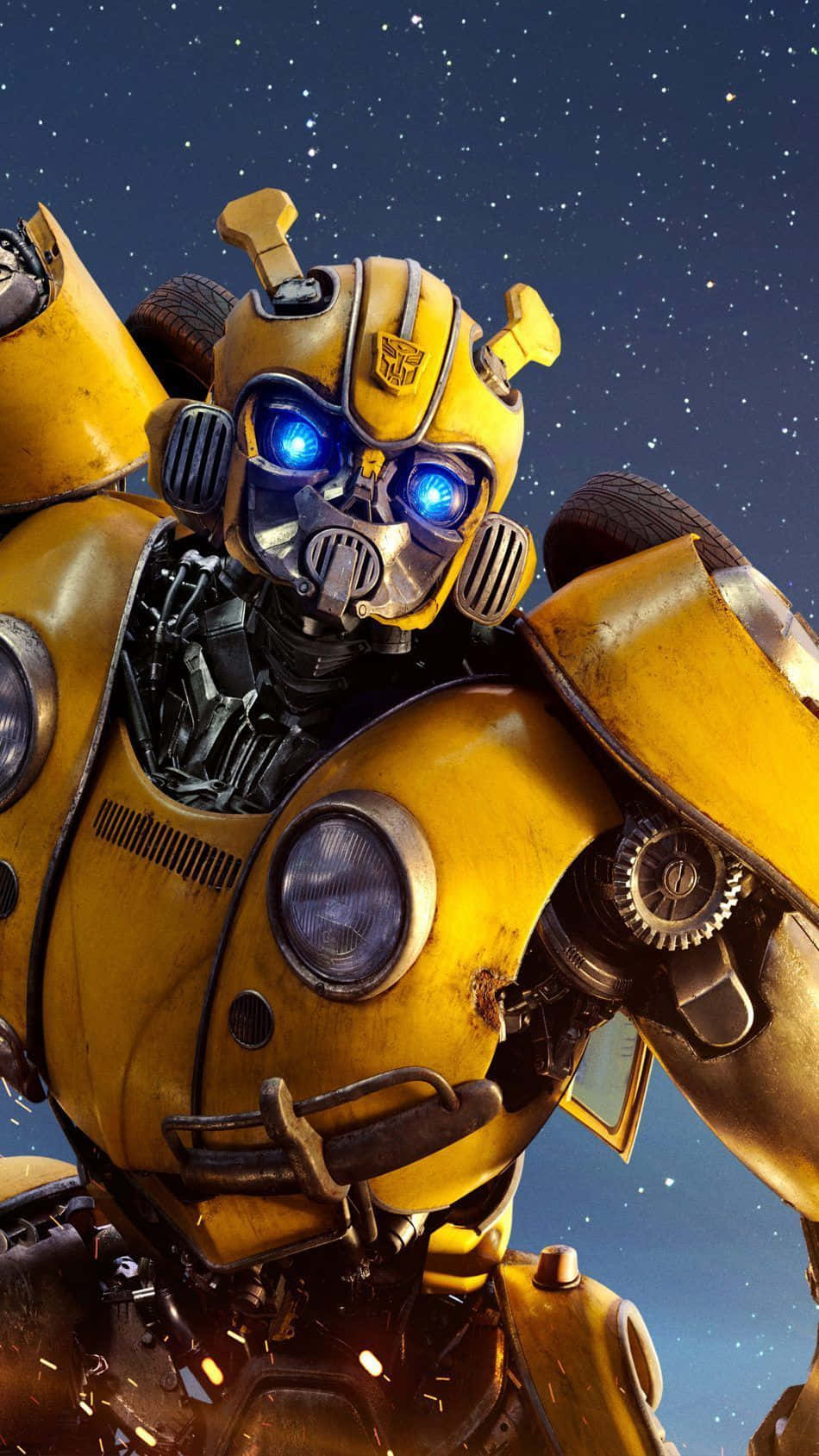 勇敢的變形金剛機器人——大黃蜂 壁紙 — 黃色機械人Bumblebee嘅特寫，佢有發光藍色眼睛，背景係滿天星星嘅夜空。
