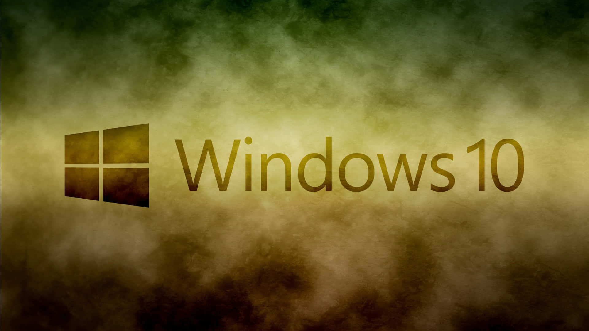 Windows 10 標誌在煙霧金色和綠色背景上。