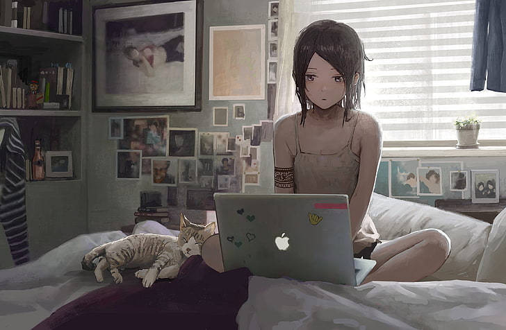 動漫女孩與貓在床上，在充滿照片的房間裡使用筆記本電腦