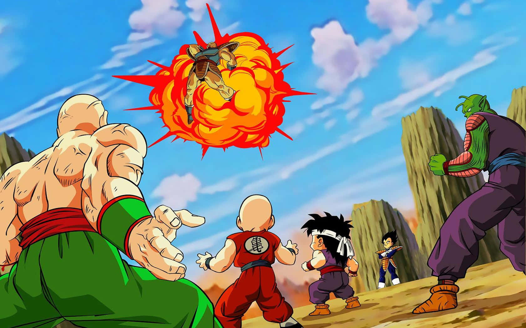 Dragon Ball Characters 桌布 壁紙 — 動漫戰士在岩石地形上，明亮的藍天下，於熾熱的爆炸中交鋒。