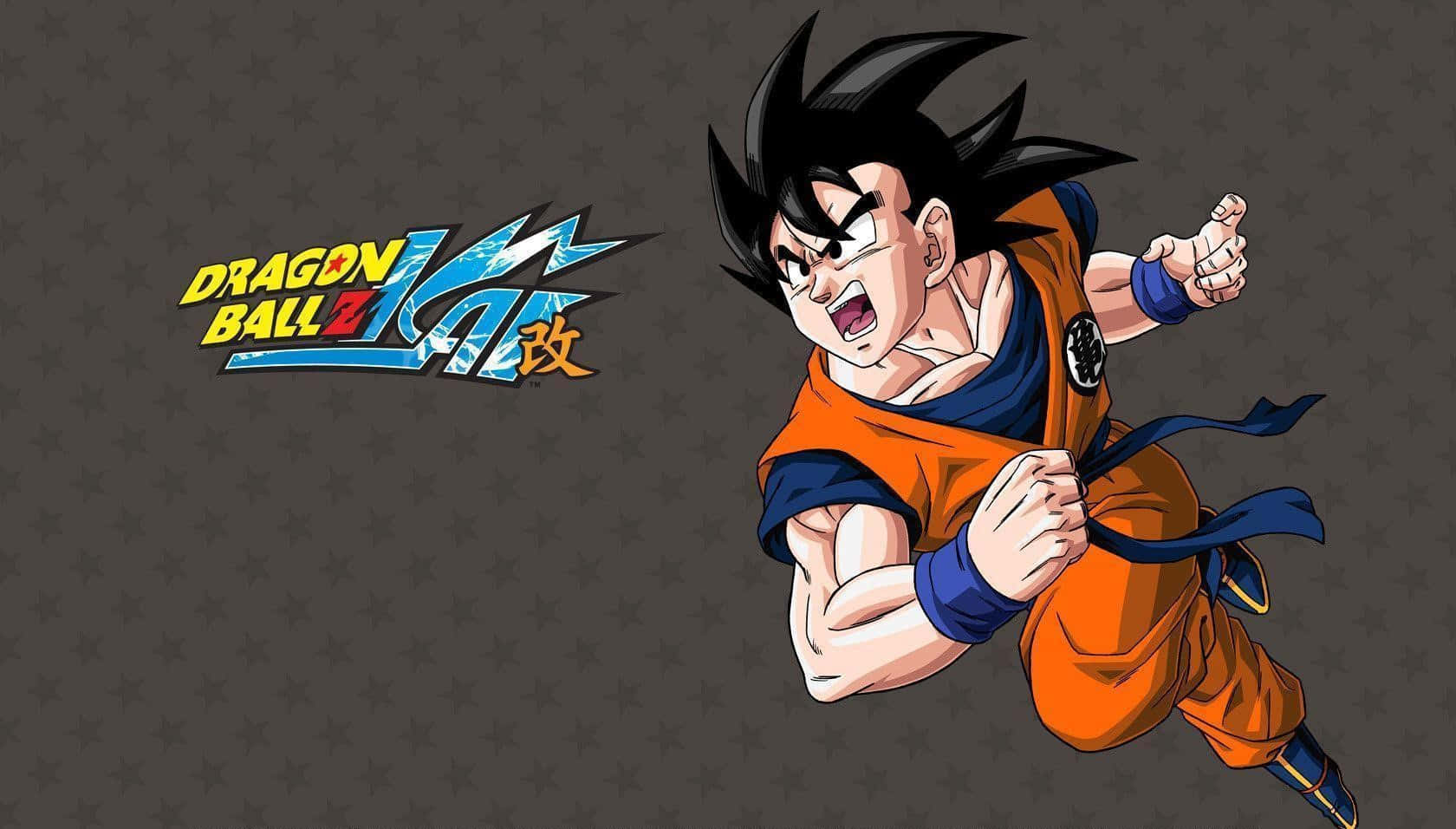 Dragon Ball Z Kai 桌布 壁紙 — 動漫角色悟空身穿橙色道服，在灰色星星圖案背景上動態跳躍，並帶有龍珠Z標誌。