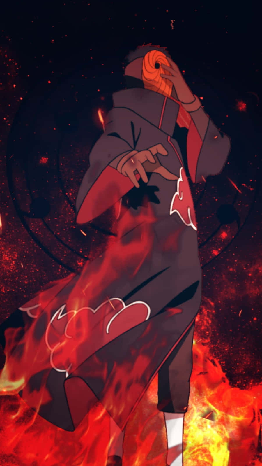 Akatsuki Tobi 桌布 壁紙 — 動漫角色身穿紅黑斗篷，在黑暗的宇宙背景下站在熊熊烈火之中。