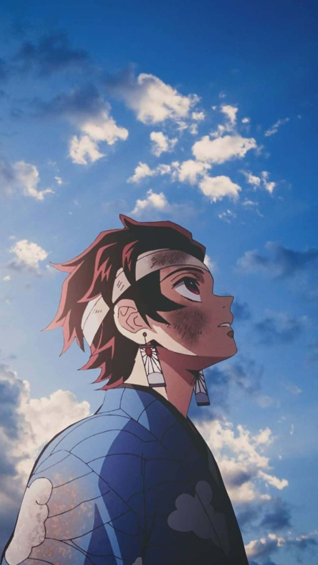紅髮戴頭帶的動漫角色仰望藍天白雲。