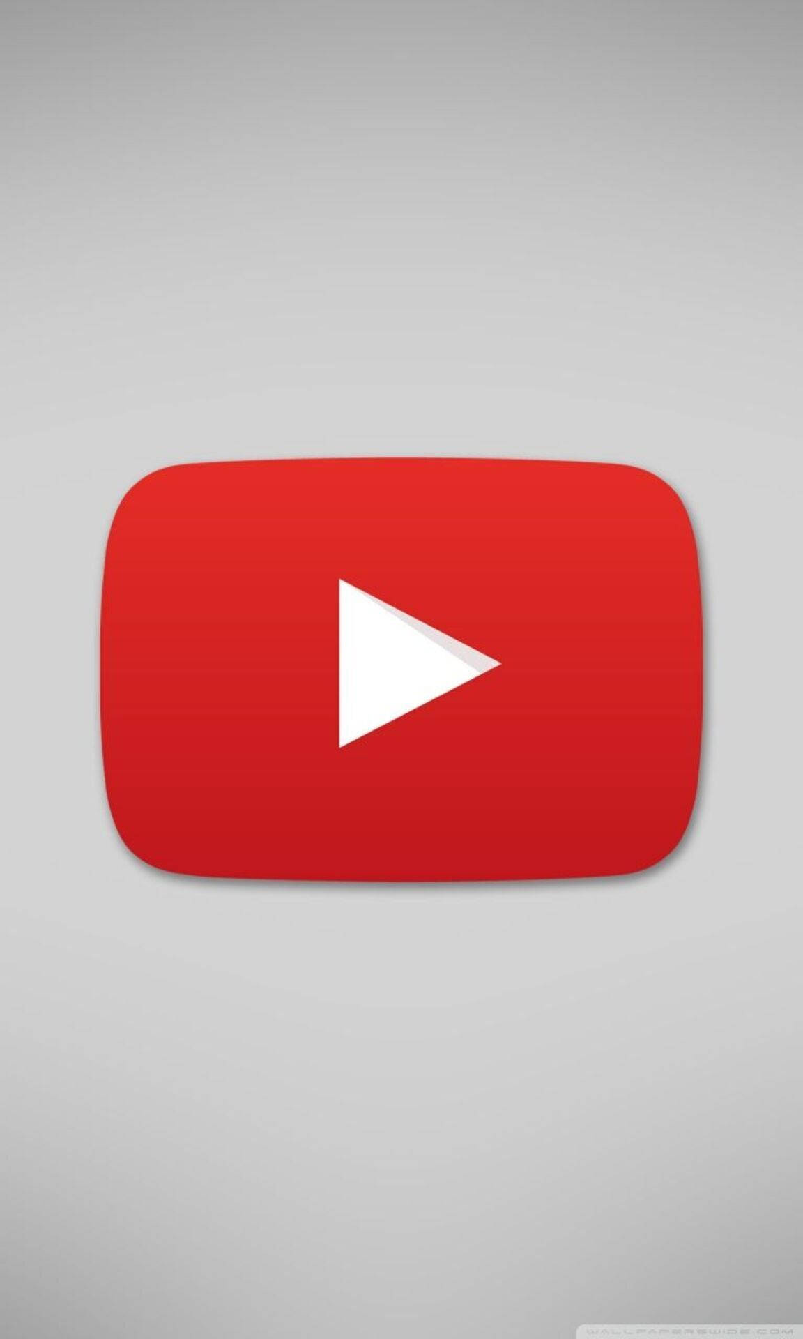 動畫YouTube播放按鈕 壁紙 — 一個大膽的紅色 YouTube 播放按鈕圖示，居中在柔和的灰色漸變背景上。