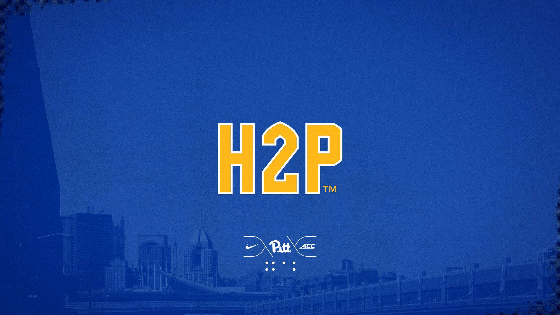藍色城市天際線，帶有黃色H2P標誌和Nike Pitt ACC品牌標識。
