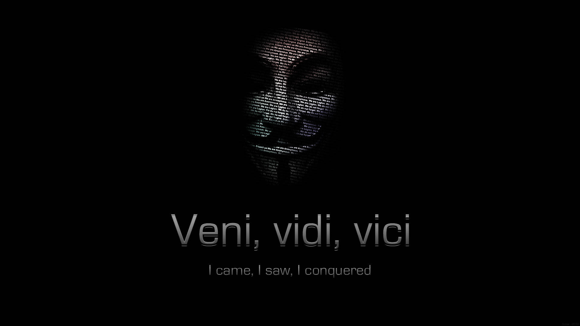 匿名者政治象徵 壁紙 — 一個由發光文字形成的黑暗面孔剪影，背景為黑色，下方有拉丁語短語 Veni vidi vici。