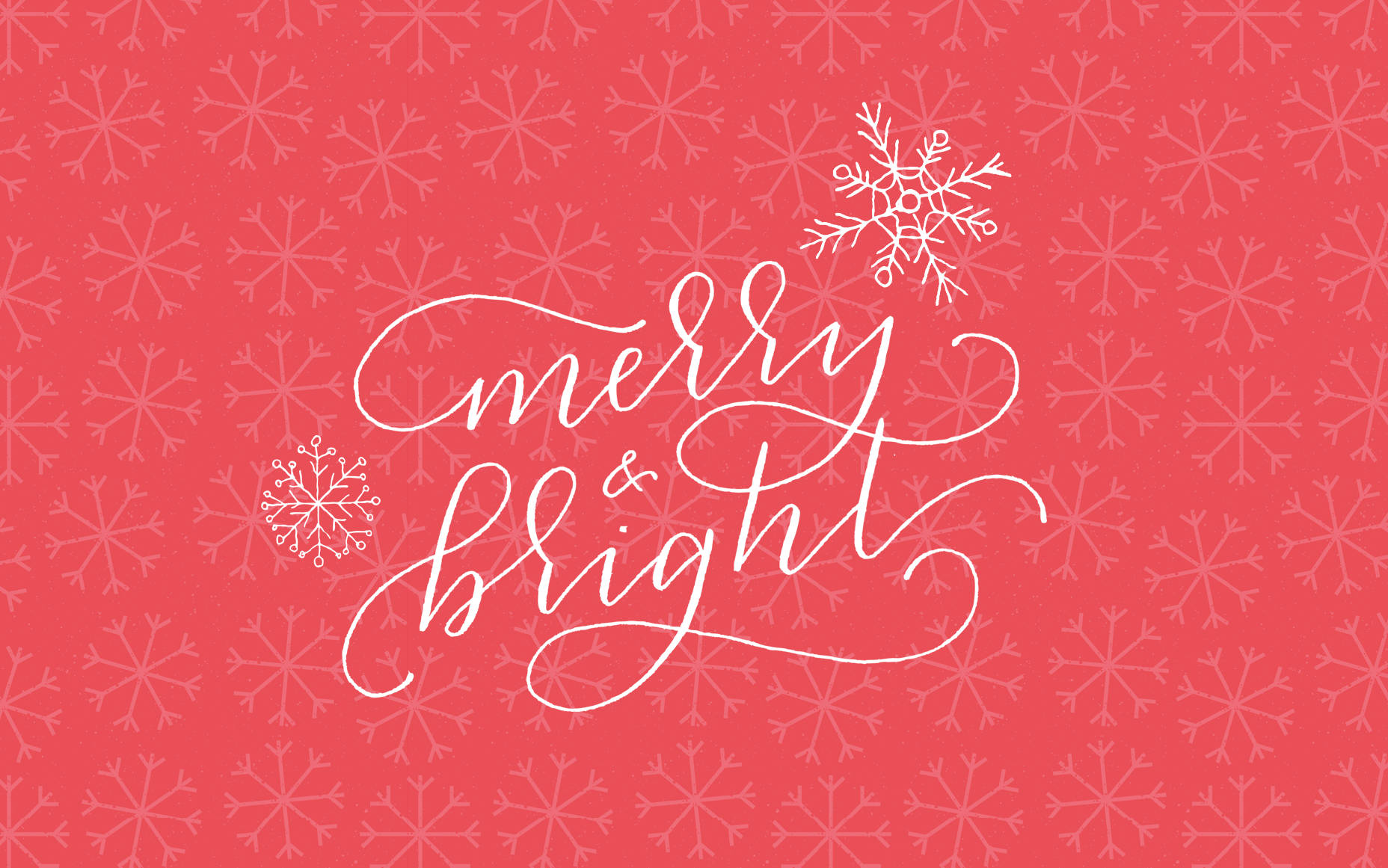 珊瑚色背景上帶有雪花的 Merry and bright 節日問候。