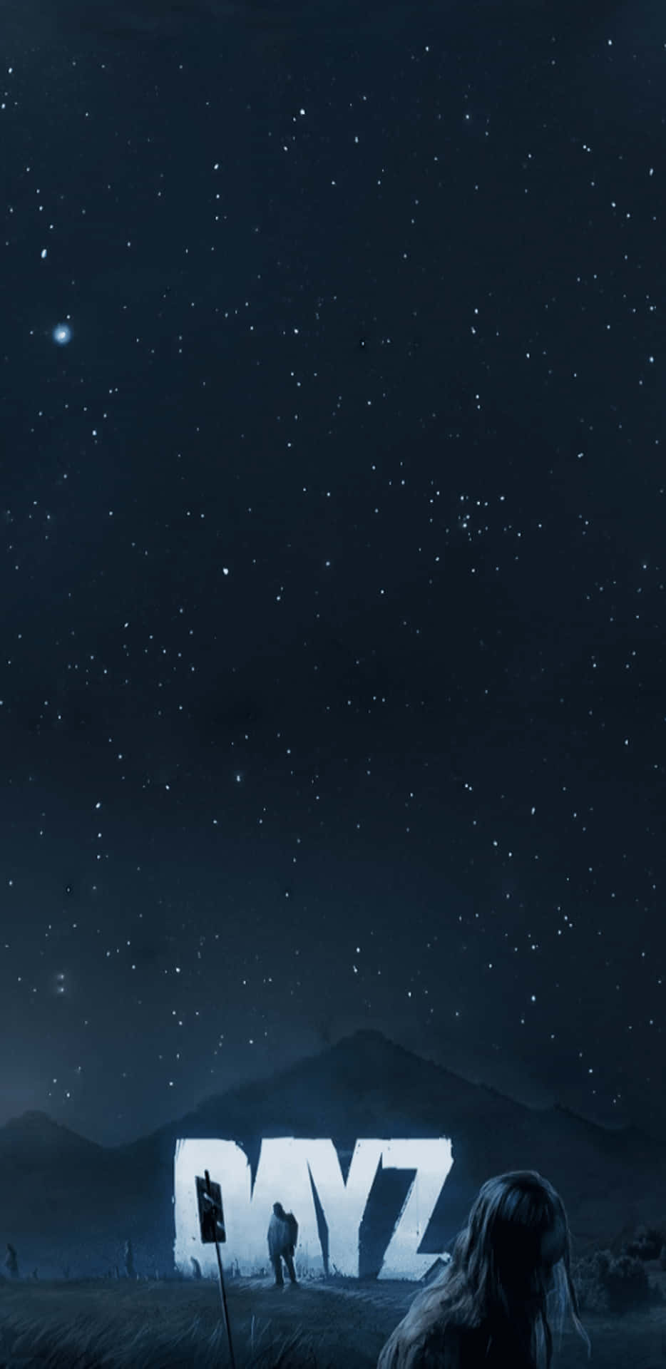 人在星空下看著發光的DAYZ標誌