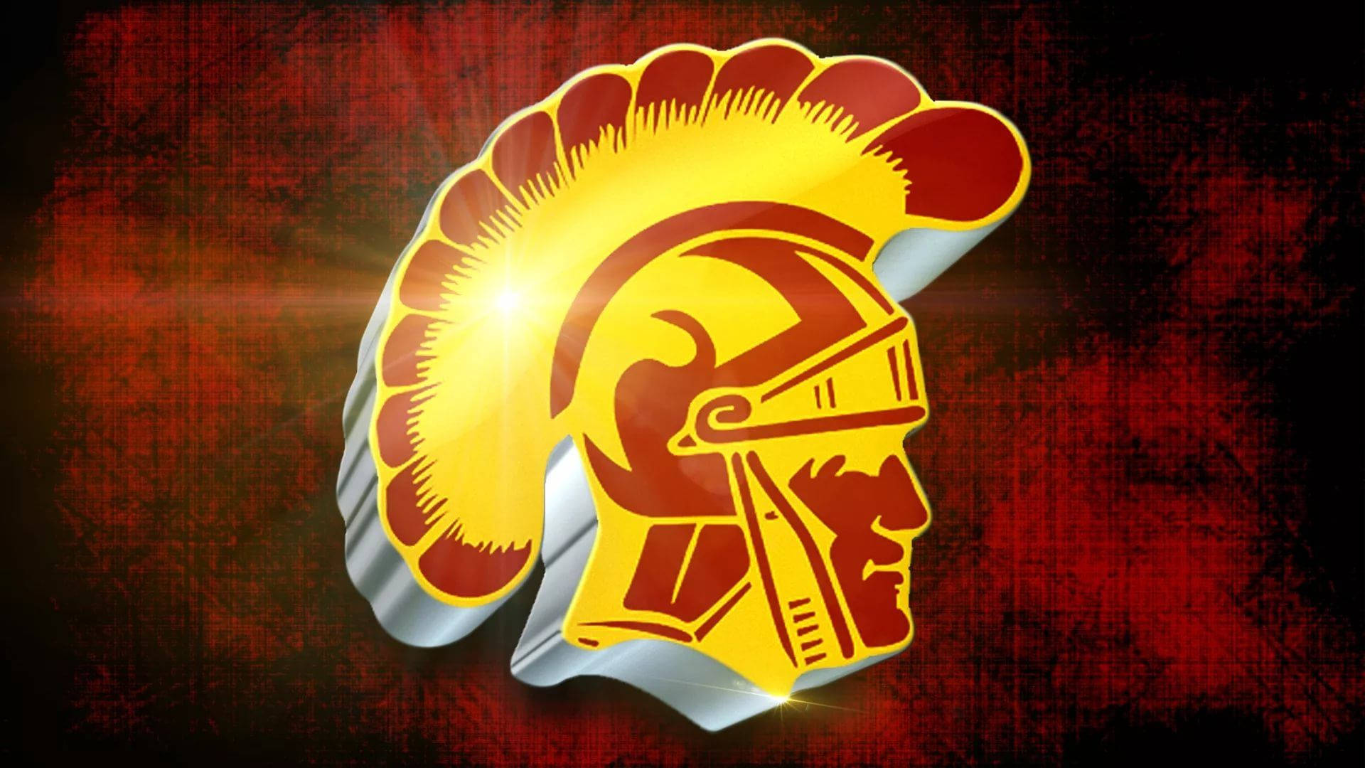 南加州大學橄欖球隊閃耀標誌 壁紙 — 一頂閃耀金色光芒的羅馬角鬥士頭盔，帶有紅色羽毛裝飾，在質感深紅色背景上格外突出。