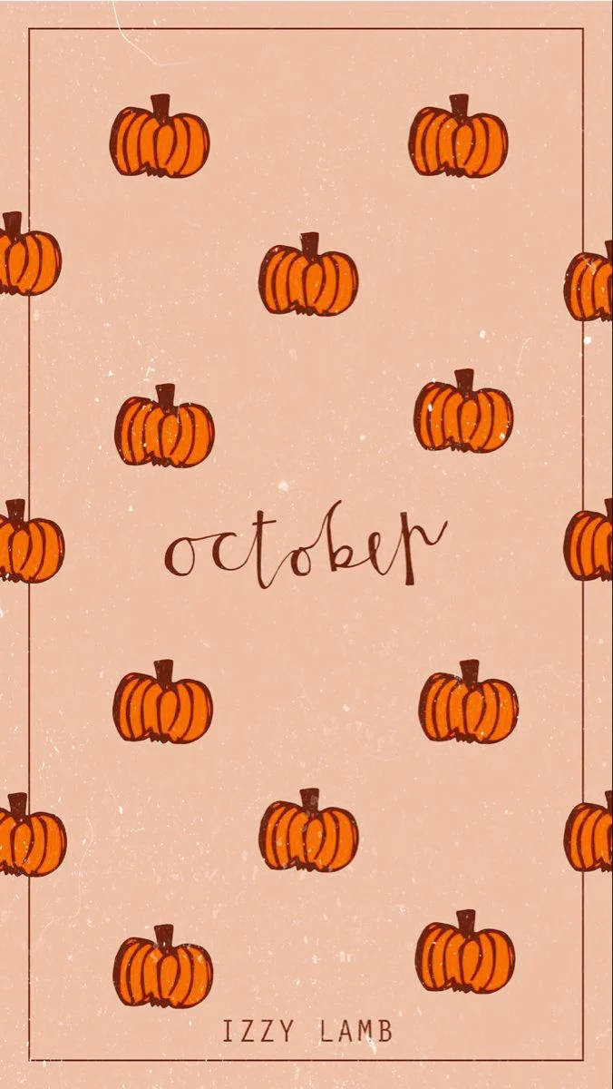 南瓜圖案牆紙，在有紋理的桃色背景上以草書寫有「October」字樣。
