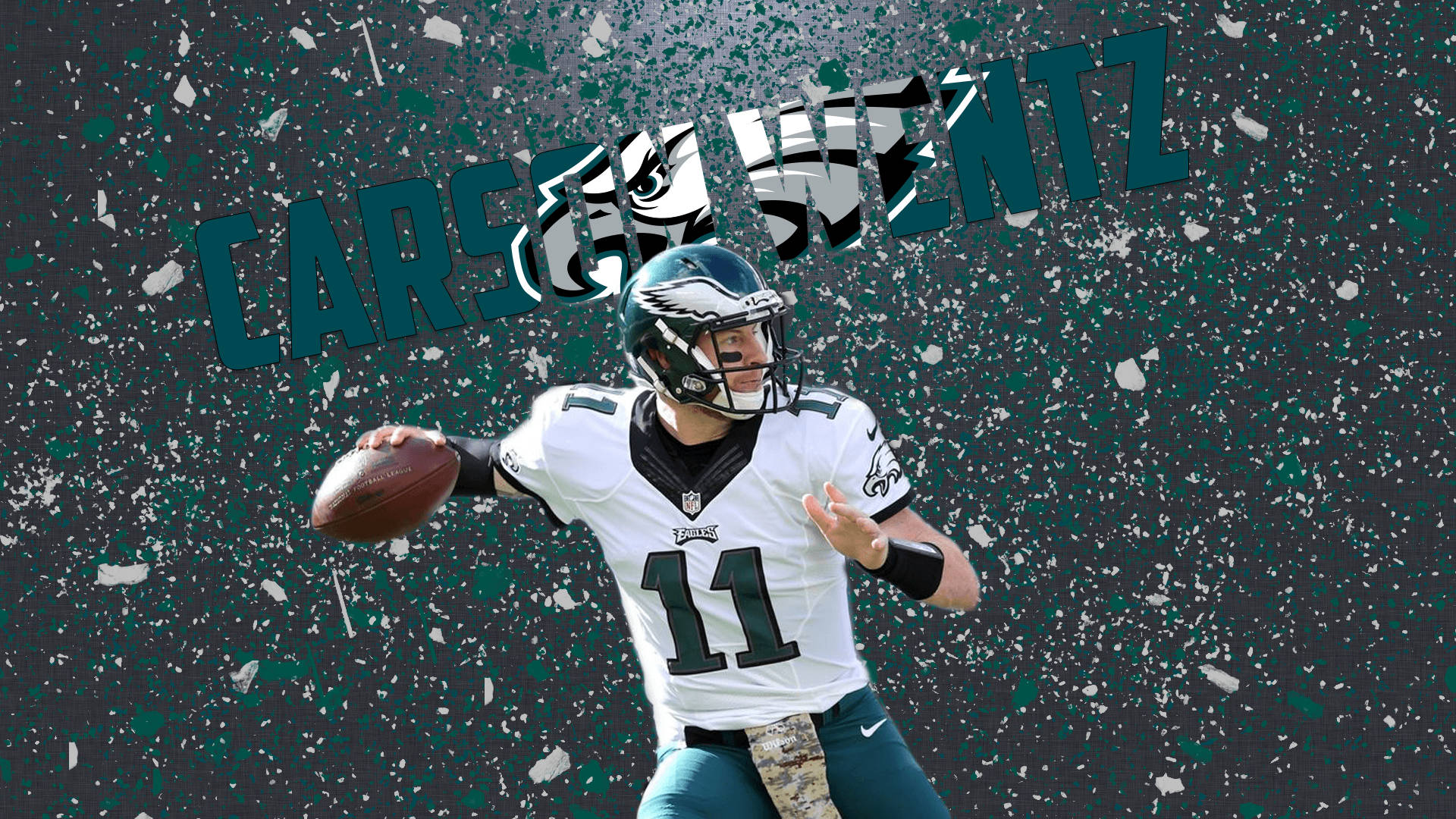 卡森·溫茲 勝利姿勢 壁紙 — 四分衛 Carson Wentz 身穿老鷹隊球衣，在綠色和白色的紙屑中擲出橄欖球，他的名字以粗體風格文字呈現。